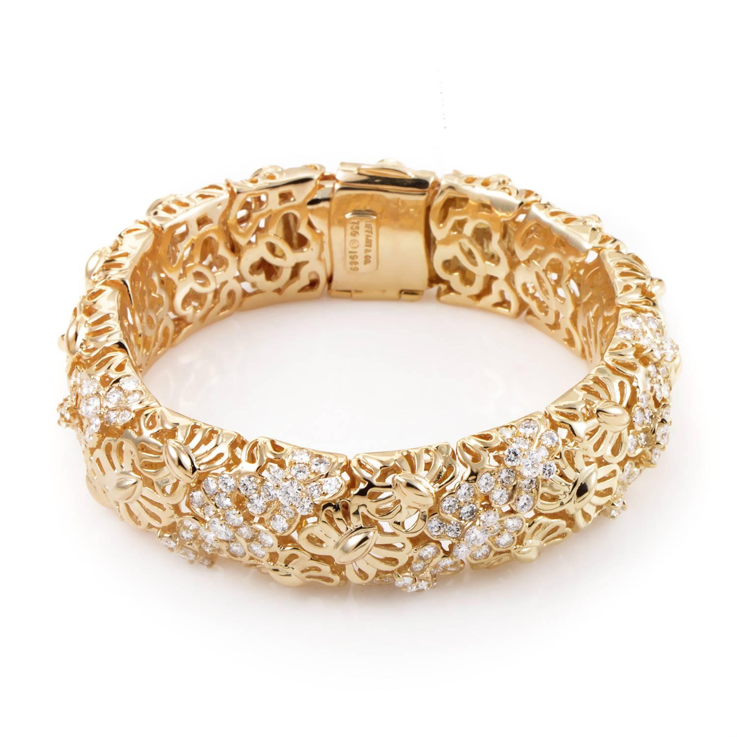 Festive and fabulous, this Tiffany & Co. bracelet is sure to please! The bracelet boasts an intricate design forged from 18K yellow gold and set with white diamonds. This beautiful bracelet can be bought individually or as part of a set. Please