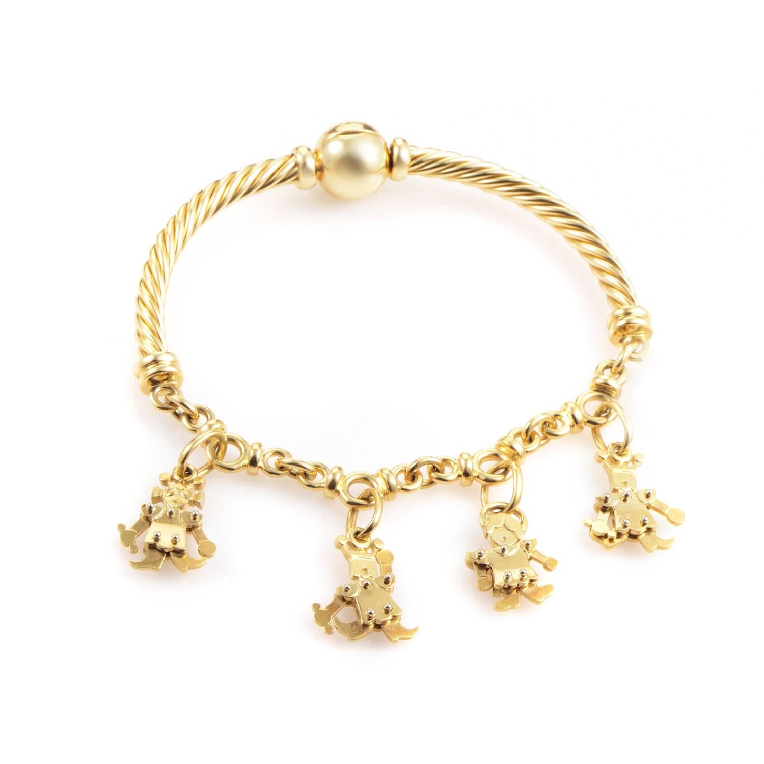 This adorable design from Pomellato is sure to dazzle and delight! The bracelet is made entirely of 18K yellow gold and boasts 4 adorable people-shaped charms.
Included Items: Manufacturer's Box