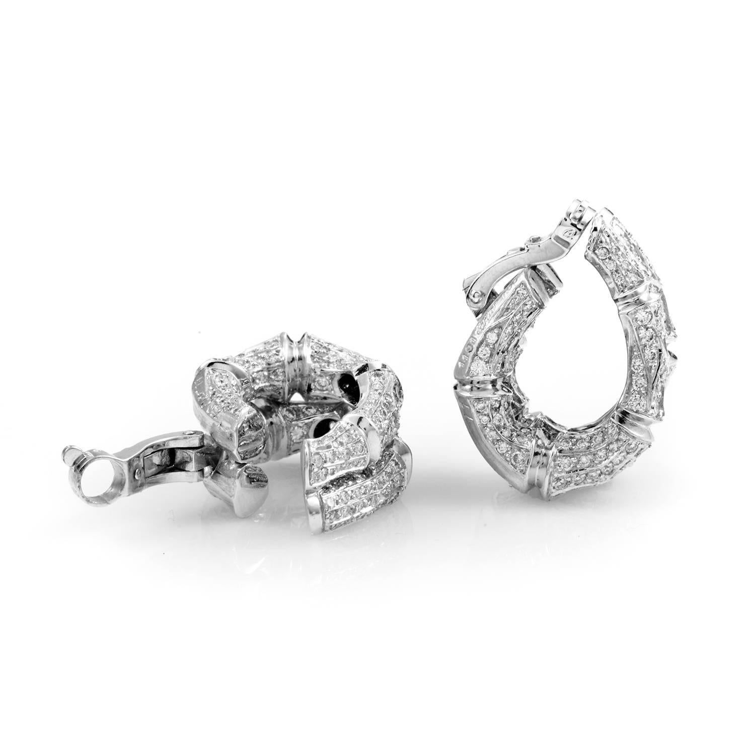 Cartier prompts precious metal to curl with exotic allure in this rare earring design. Twin bamboo shoots of 18K white gold embrace the air, rolling into themselves with organic rhythm. Every measure of this arcing design shimmers with the