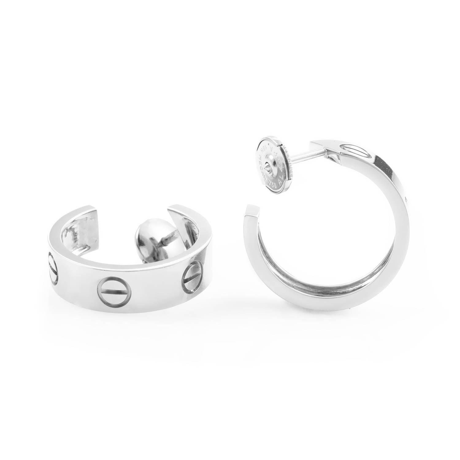 18K white gold is spun through a series of engraved impressions familiar to the Cartier Love collection. Perfectly forged, dignified yet unquestionably regal, these Cartier earrings are a perfect addition to any ensemble.
Included Items: