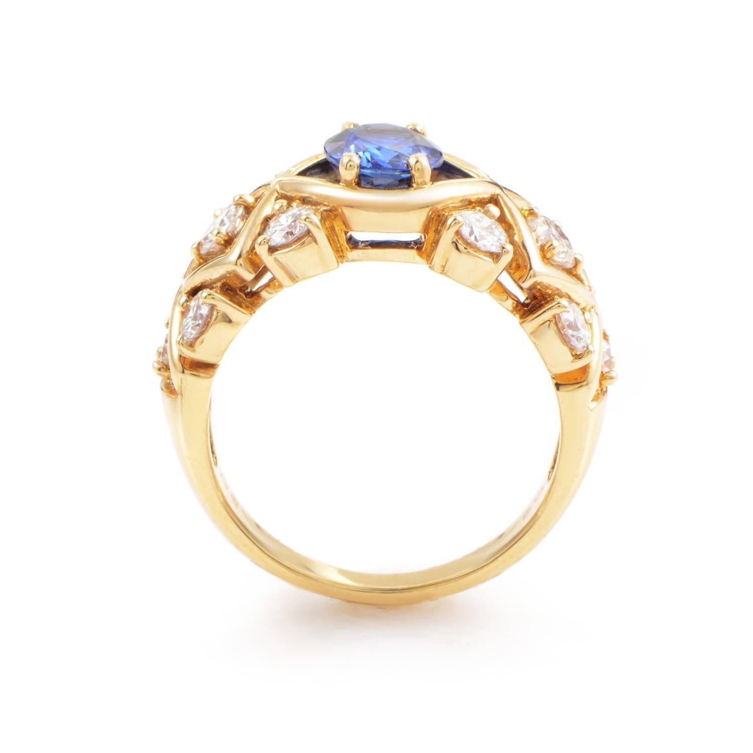 18K yellow gold rises from a mere pristine band into threaded complexity, stretching and weaving frames around every precious stone in its path. A pattern of 1.15ct of white diamonds precede the prominent peak of a 1.38ct blue sapphire, which the