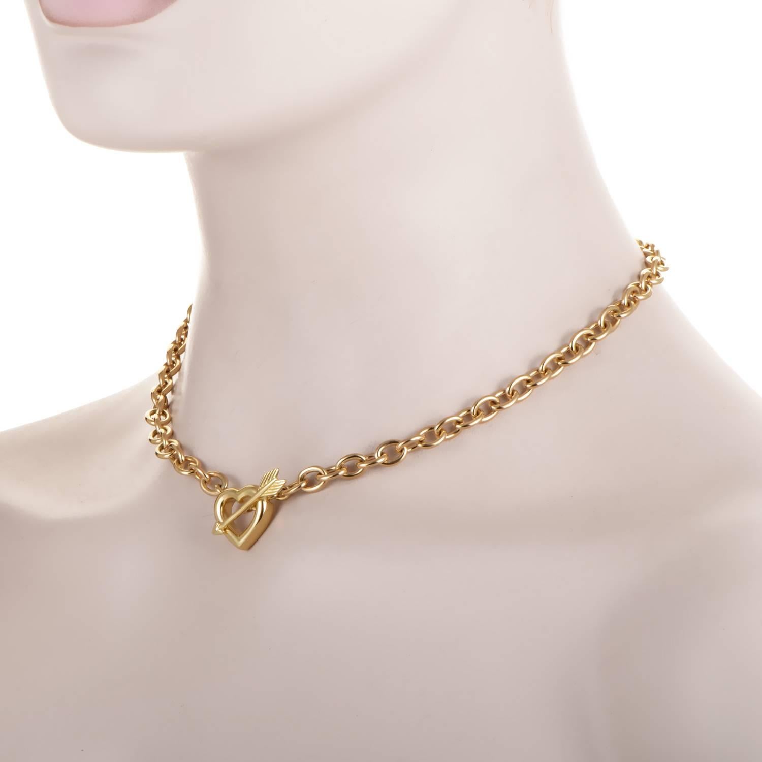 This stylish design from Tiffany & Co. will never go out of style! The necklace is made of 18K yellow gold and boasts a toggle clasp fashioned from a heart and arrow.
Included Items: Manufacturer's Box
