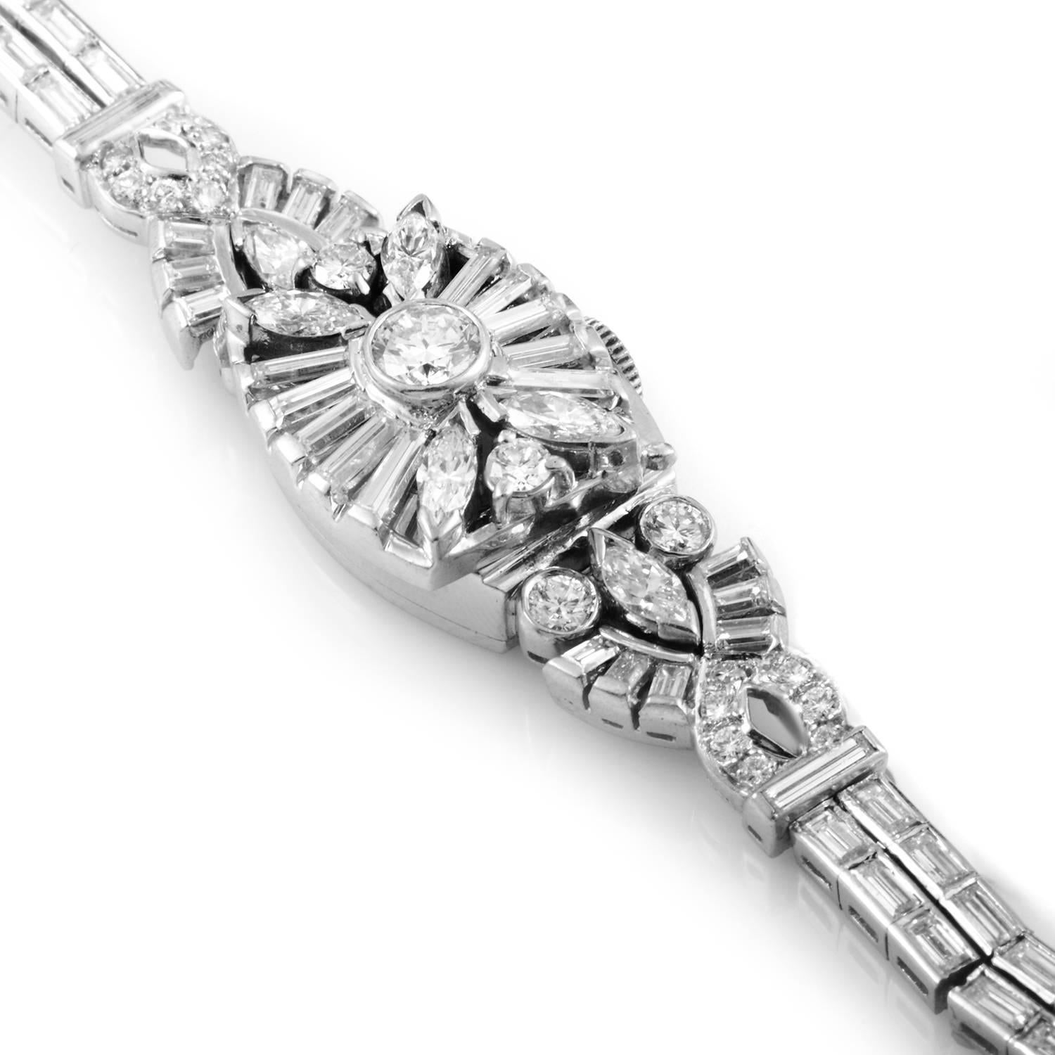 This watch is its own enthralling piece of jewelry. Forged from Platinum, this antique is pieced together in intricate detail, spinning patterns into cohesive design guaranteed to draw admirers at every turn. Giving compliment to each segment are