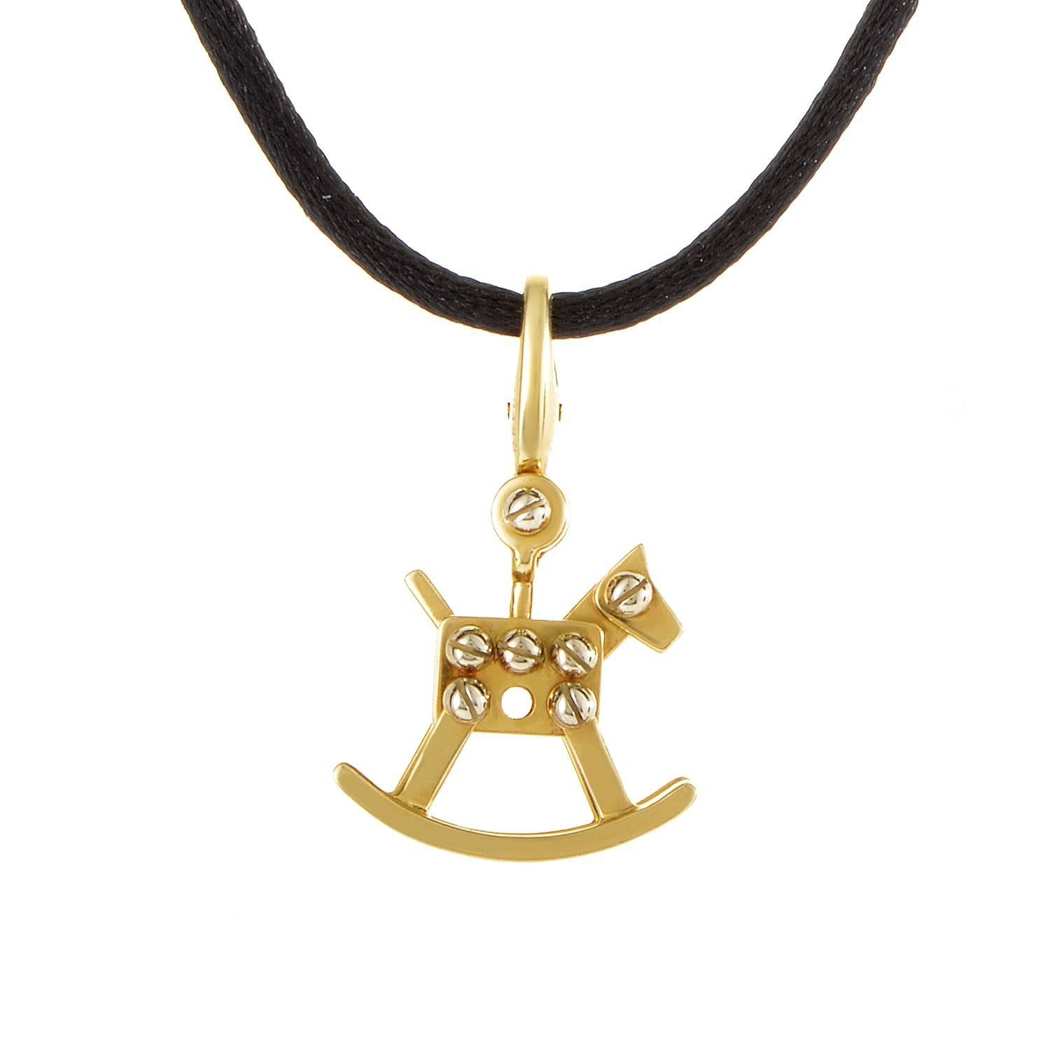 This adorable Cartier pendant necklace is the perfect keepsake gift. The necklace is a black silken cord from which hangs a petite 18K yellow gold rocking horse. Lastly, the horse is studded with small white gold bolts.
Approximate Dimensions: Drop