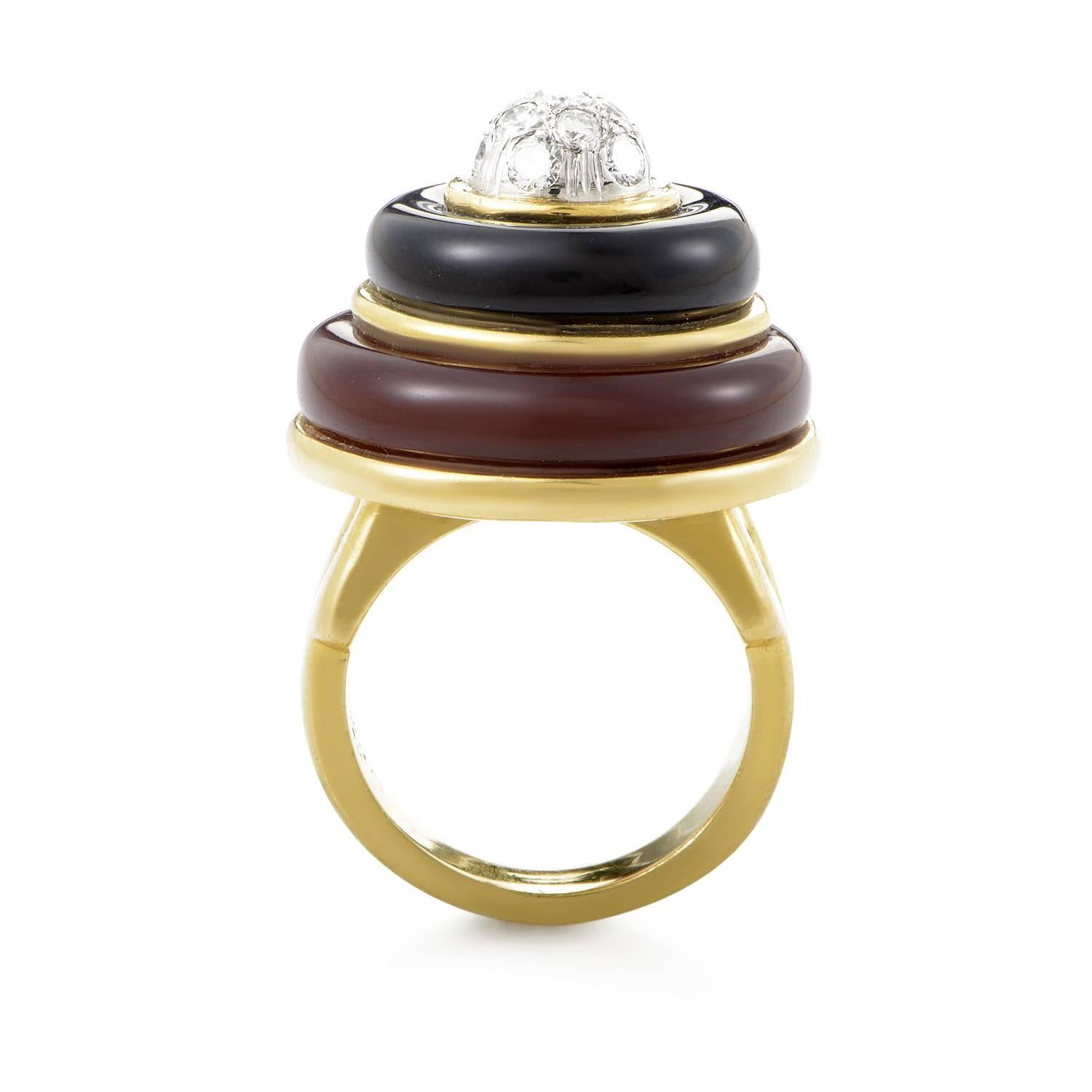 Designs from Tiffany & Co. are always instant classics. This ring from the renowned brand is made of 18K yellow gold and is accented with black and red onyx. Lastly, a bed of white diamonds sits atop the black onyx for an additional dash of