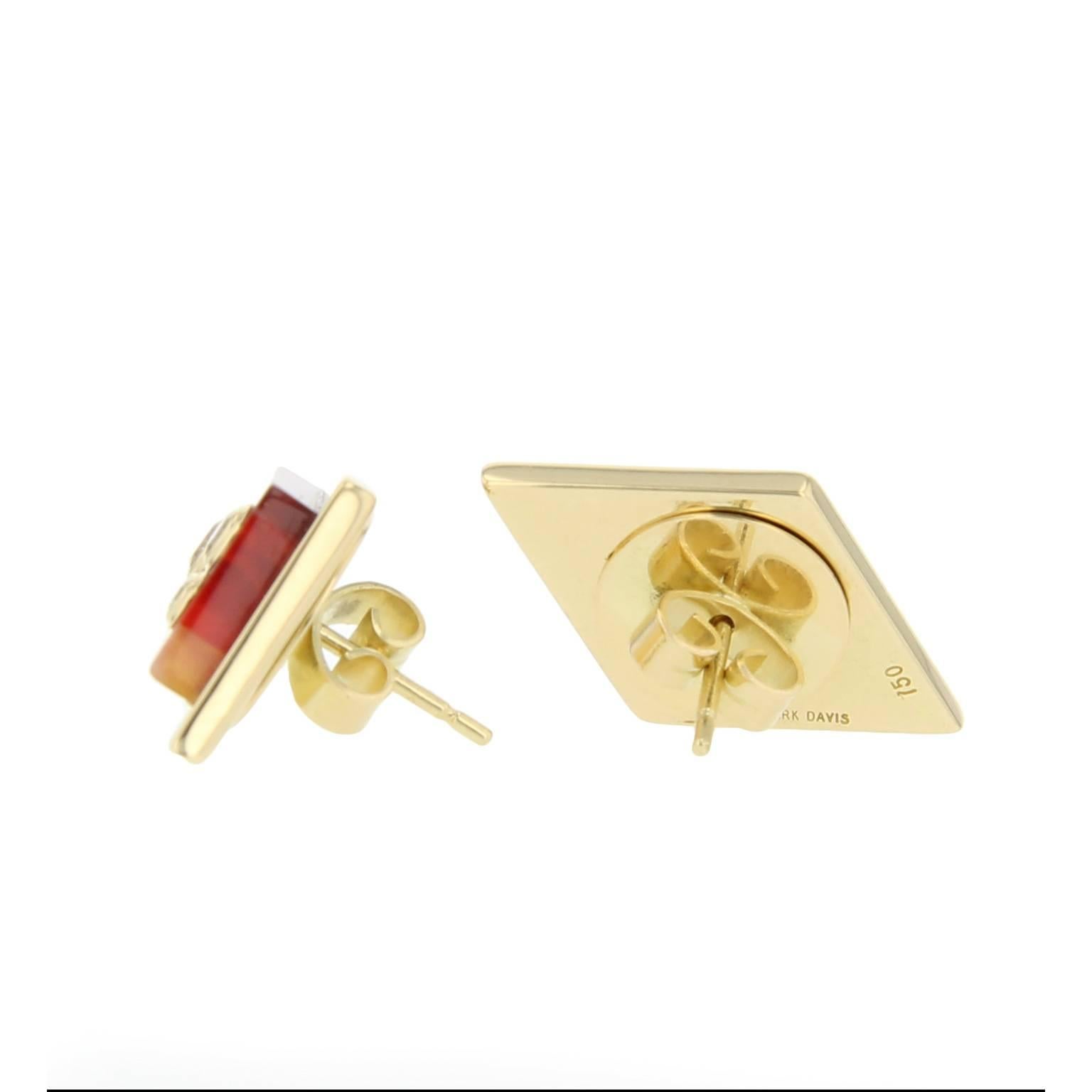 These kite-shaped stud earrings are created using laminated strips of pink and burgundy bakelite mounted in polished 18k yellow gold frames. They are adorned with fine diamonds set in 18k yellow gold bezels.

Full details below: 
• From the Mark