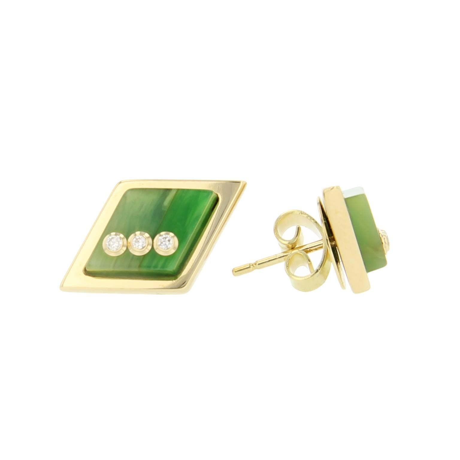 These kite-shaped stud earrings were handcrafted using laminated pieces of marbled green bakelite mounted in polished 18k yellow gold bezels.  Each with a row of three fine diamonds set in individual 18k yellow gold bezels.

Full details below: 
•