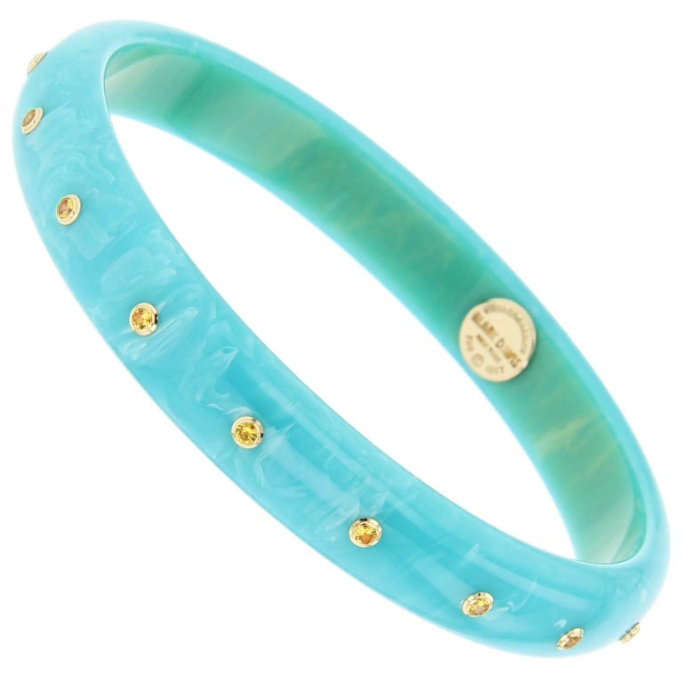 Green, Brown, and Yellow Sapphire Bakelite Bangle