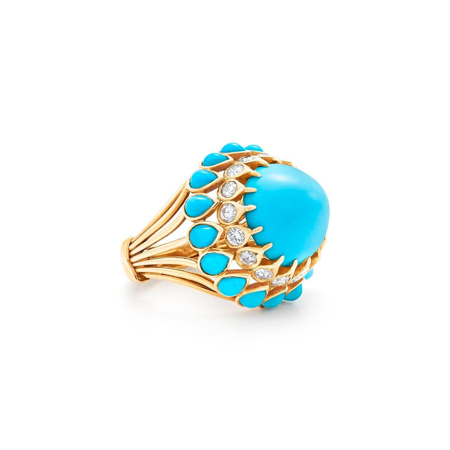 Set with a central cabochon turquoise (not quite a sugarloaf), within a round diamond gallery to the bezel-set pear-shaped cabochon turquoise frame to the reeded shoulders, mounted in 18k gold, circa 1960s
Signed Cartier, Paris

Total weight of the