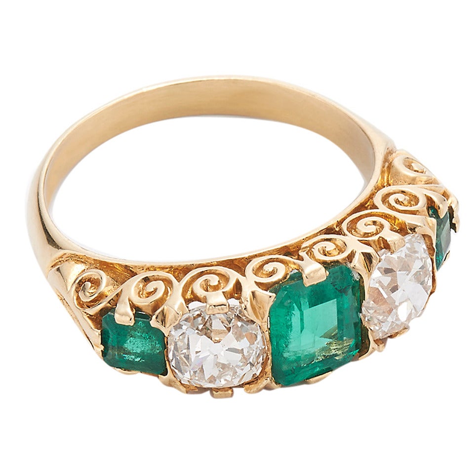 1890s Emerald Diamond Gold Three-Stone Ring