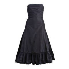 2003 ALEXANDER MCQUEEN black taffeta dress with pleated hemline trimmed in fur 9