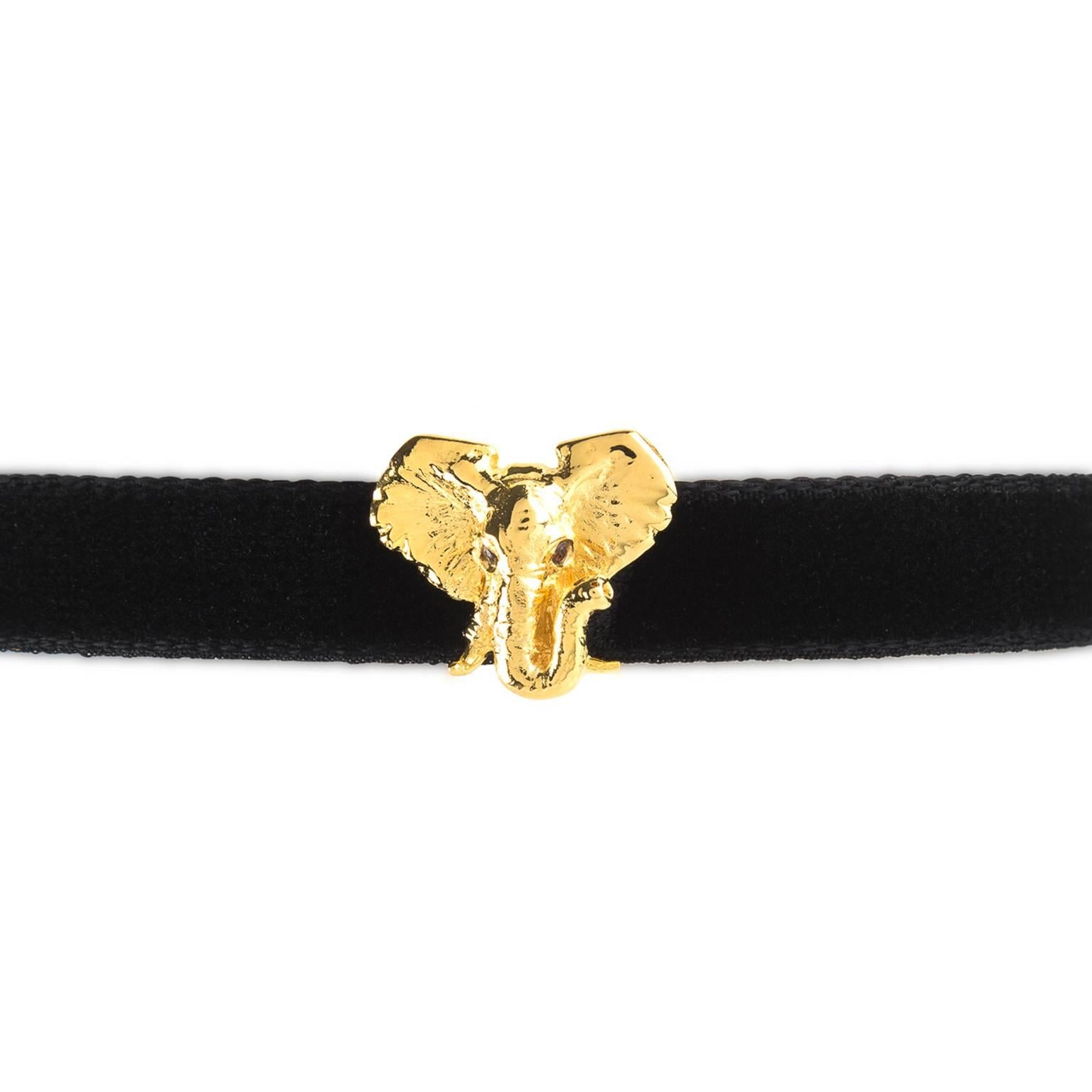 Show some love for elephants with this velvet bracelet featuring a golden elephant head. The sparking black eyes of the elephant are 0,02 carat diamonds. The NiNi elephant head is fashioned in yellow gold vermeil. The black velvet is double thick