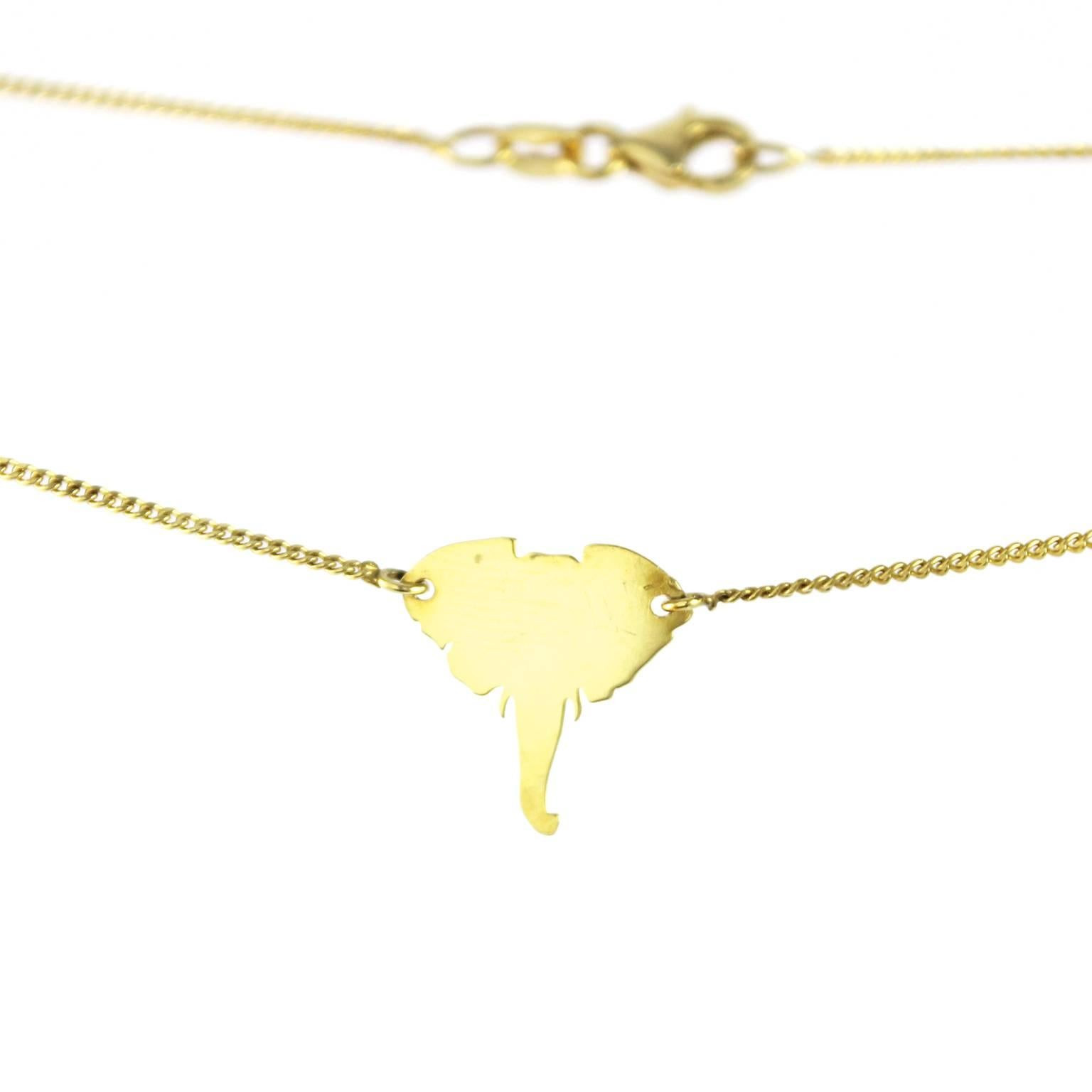 This NiNi necklace combines simple elegance with a sleek, modern look.  The delicate NiNi elephant head is lovingly crafted from 14 karat gold.   The 42 centimeter chain is and the clasp is made of 14 karat gold. 

This necklace is part of a
