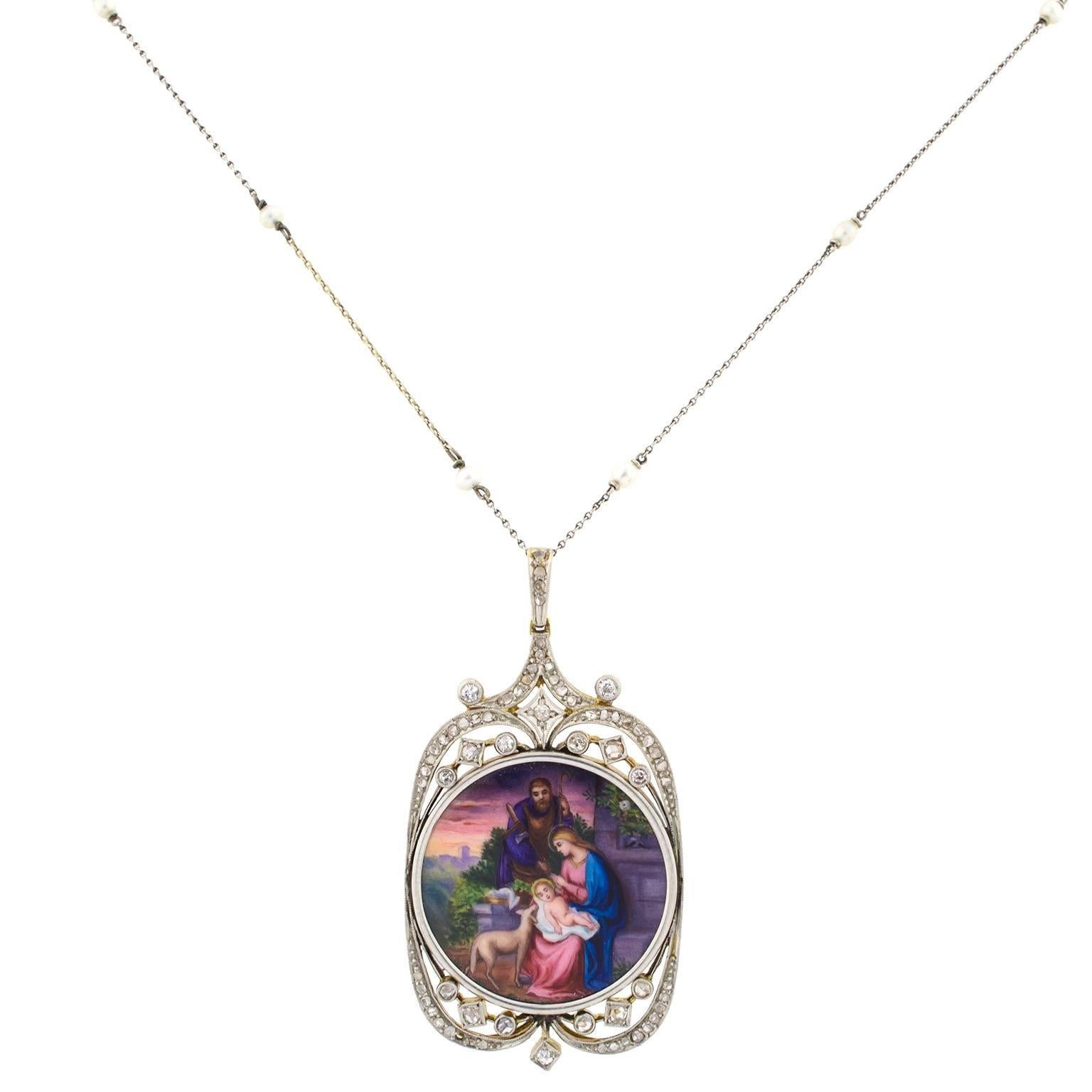 Early 20th century platinum-topped gold pendant representing the nativity in enamel decorated with diamonds. It comes with a platinum and pearls chain from the same period.