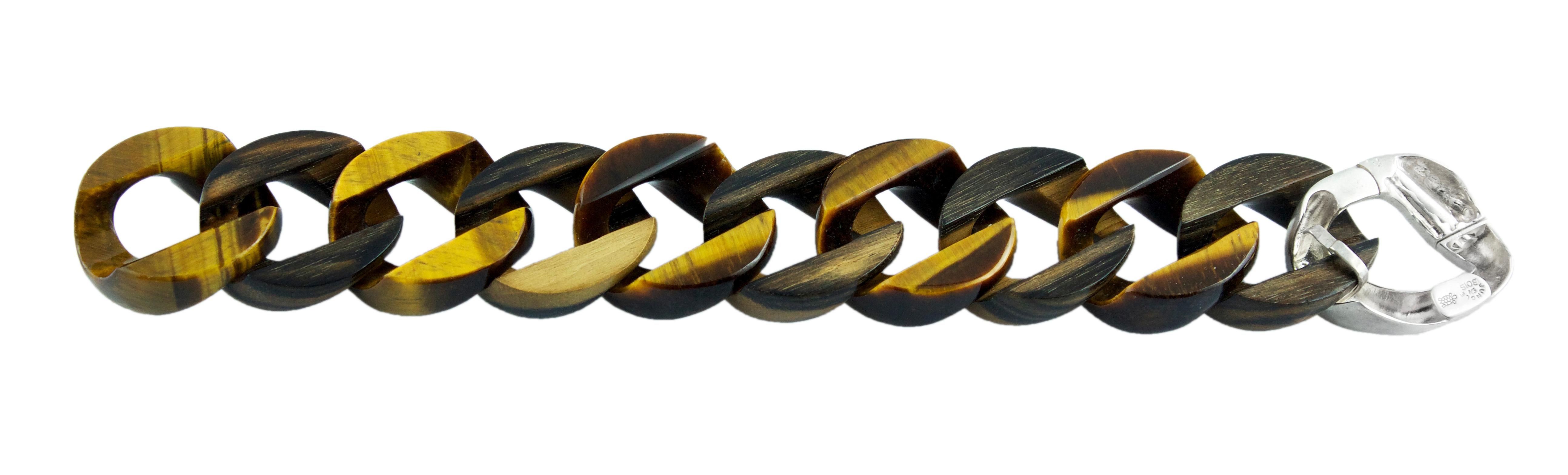 Elegant bracelet totally hand-carve made in wood and tiger's eye. 
Mounting in silver 925.
Length 22 cm but is possible to remove links to have it shorter.