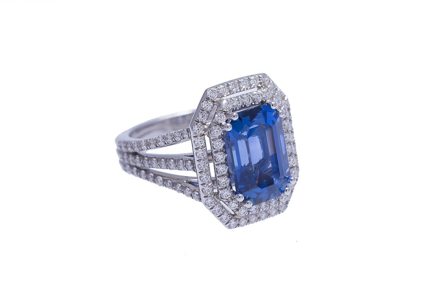 Platinum cocktail ring containing one emerald cut sapphire weighing 4.34 carats and one hundred fourteen diamonds weighing combined 0.79 carat. The sapphire has a highly desirable shade of blue with very good saturation. The diamonds are G color, VS