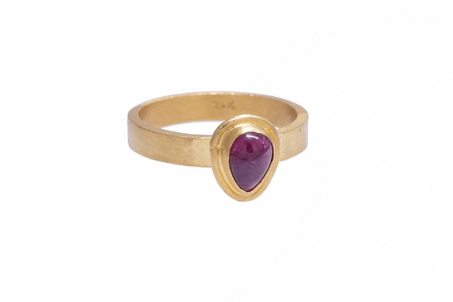 24K yellow gold Yossi Harari ring with bezel set pear shape pink tourmaline cabochon.
Pink Tourmaline is 6mm x 4.5mm. The shank is flat and 3.3 mm wide.
Size 7. Can be sized.