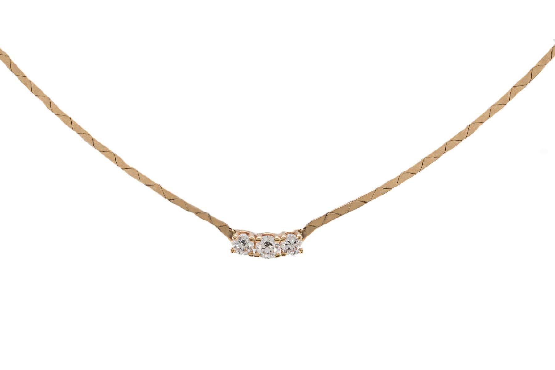 18K gold flat necklace with 3 round brilliant cut diamond weighing combined 0.37 carat. The necklace is approximately 16.5