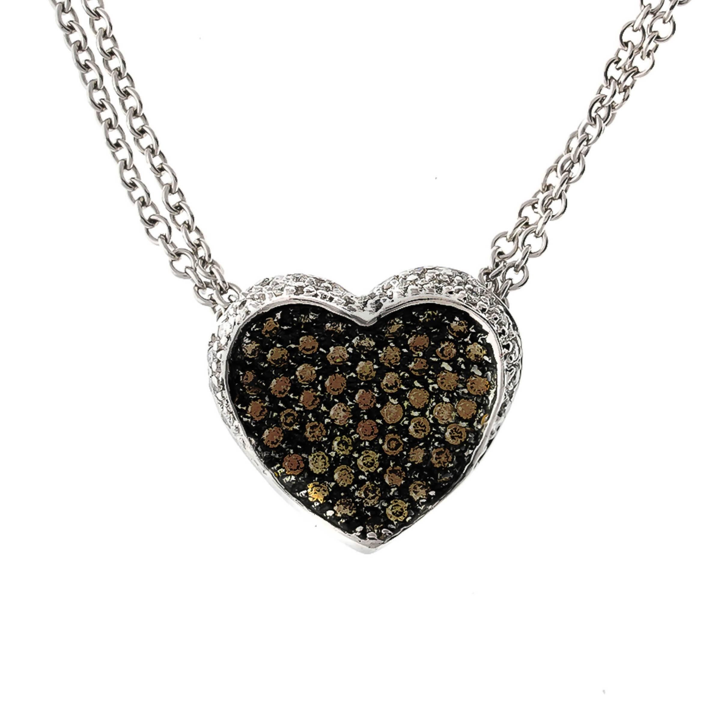 14K heart pendant on a double chain. The pendant contains 0.45 carat pave set cognac diamonds and 0.15 white diamonds. 