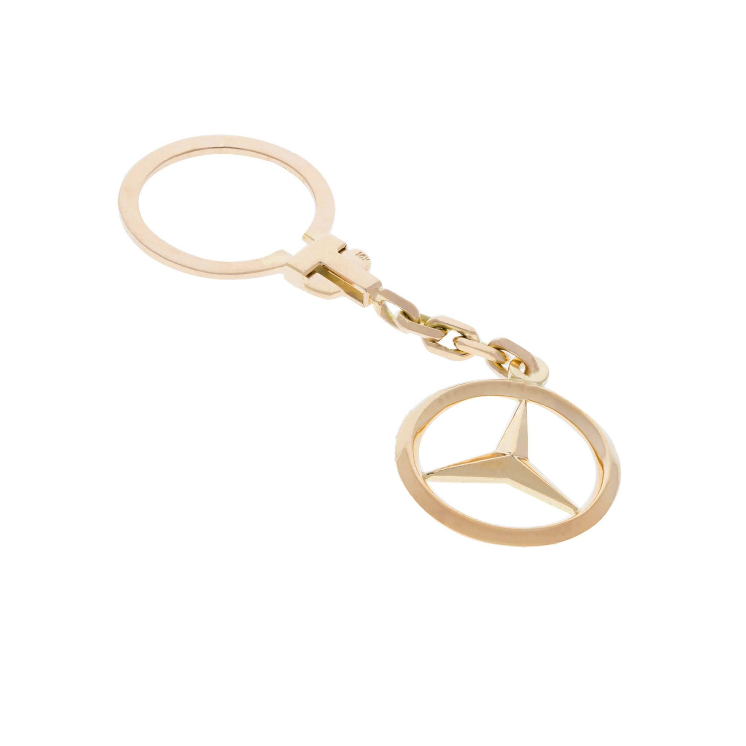 14K Mercedes Benz key ring.