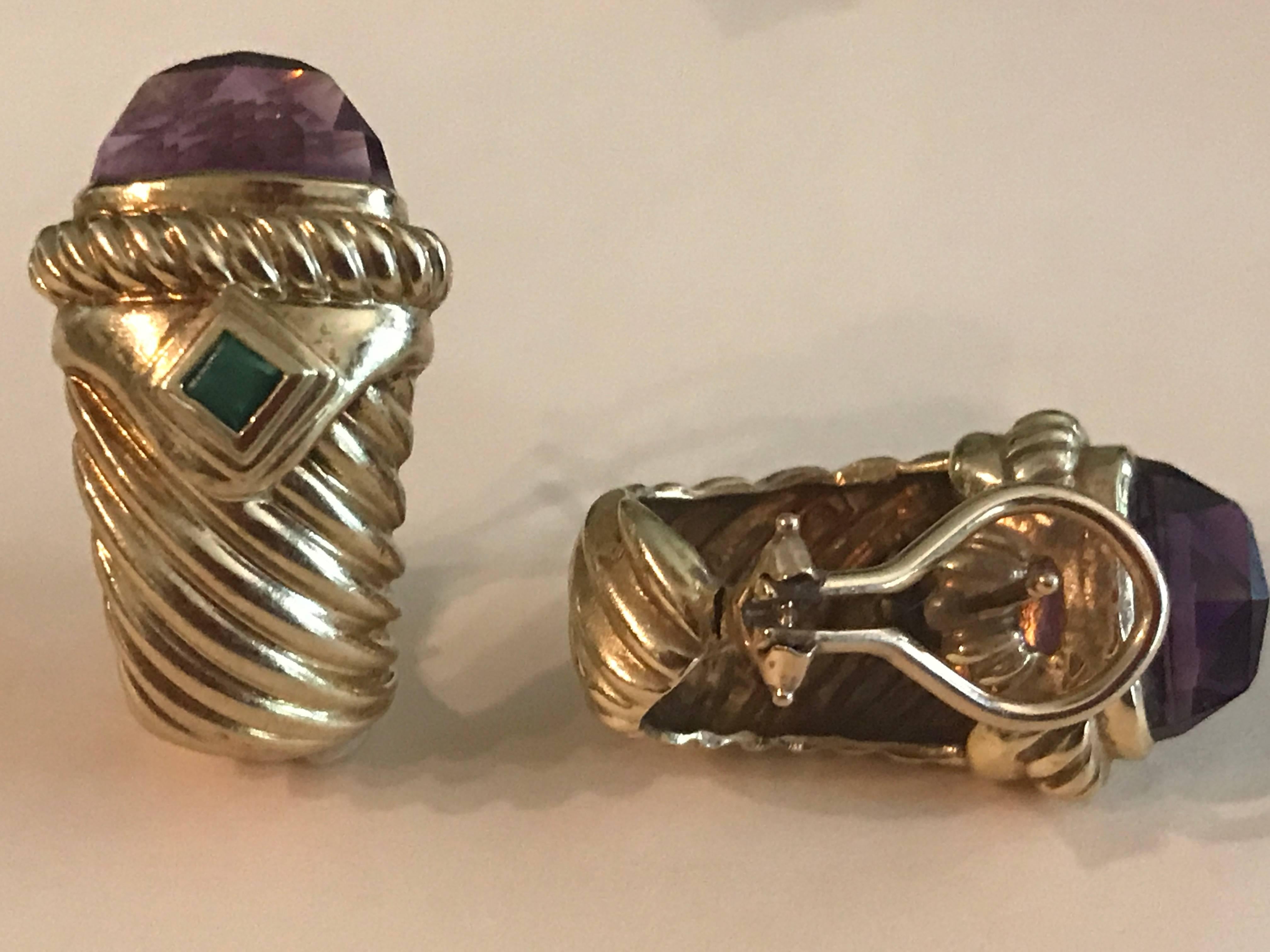 18K yellow gold torsade earrings with faceted amethyst and emerald. The earrings have a post and clip.