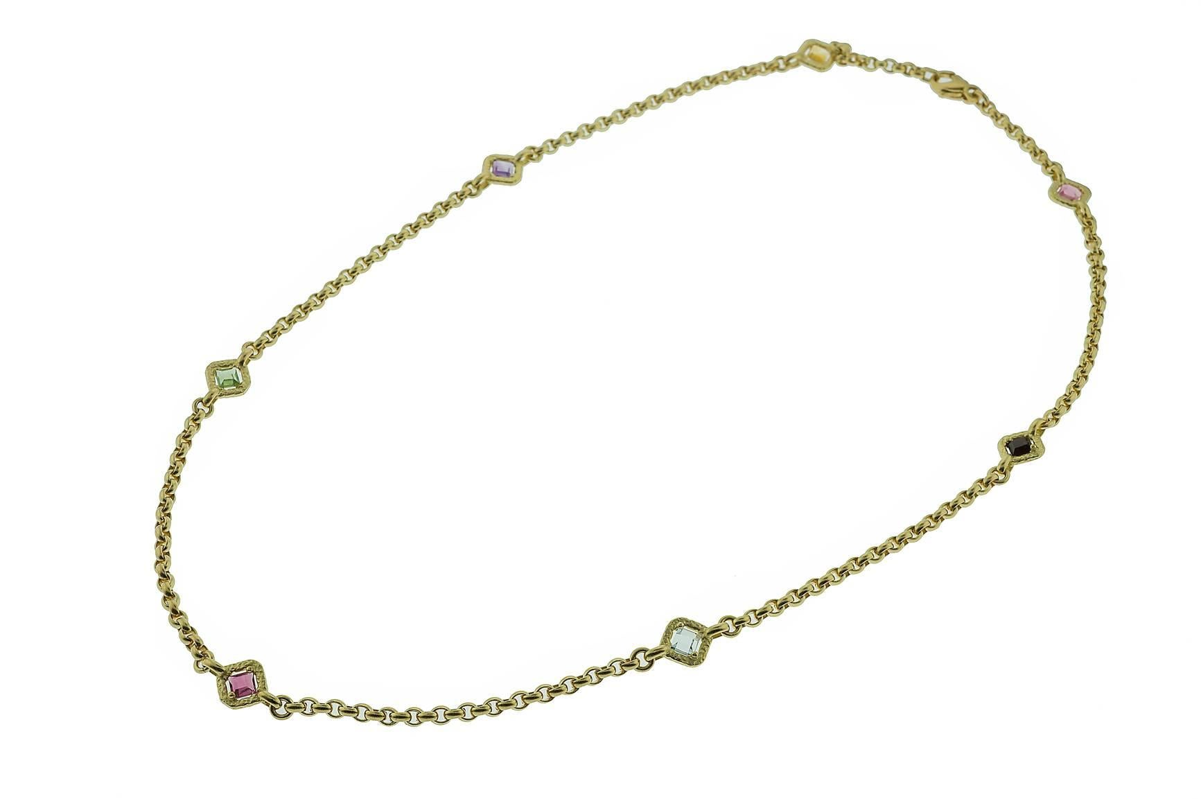 18K yellow gold brushed finish rolo chain with colored gem stations. 