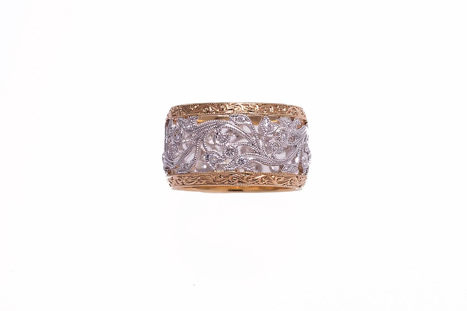 Platinum and 18K rose gold diamond band ring. The diamonds weigh combined 0.34 carat, G color, VS clarity. The ring is size 6.5