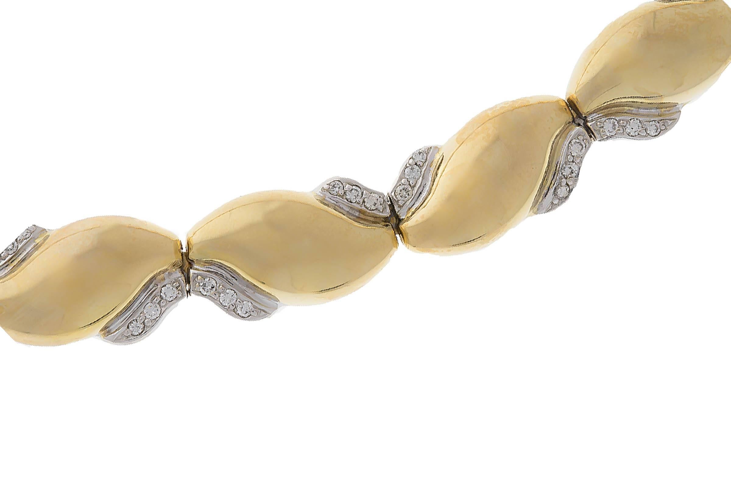 18K gold choker necklace with pave set diamond sections. The diamonds weighs combined 0.72 carat, G color, VS clarity.
