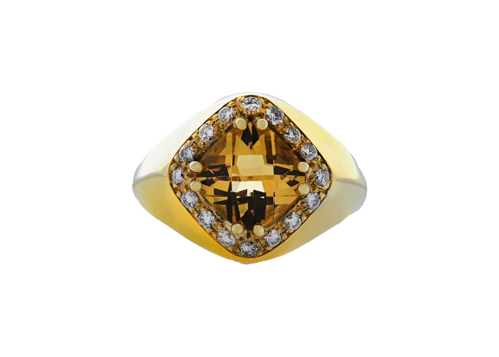 18K cushion/checkerboard cut citrine and diamond ring. The citrine is surrounded by pave set diamonds weighing combined 0.37 carat.
Size 6. Can be sized.