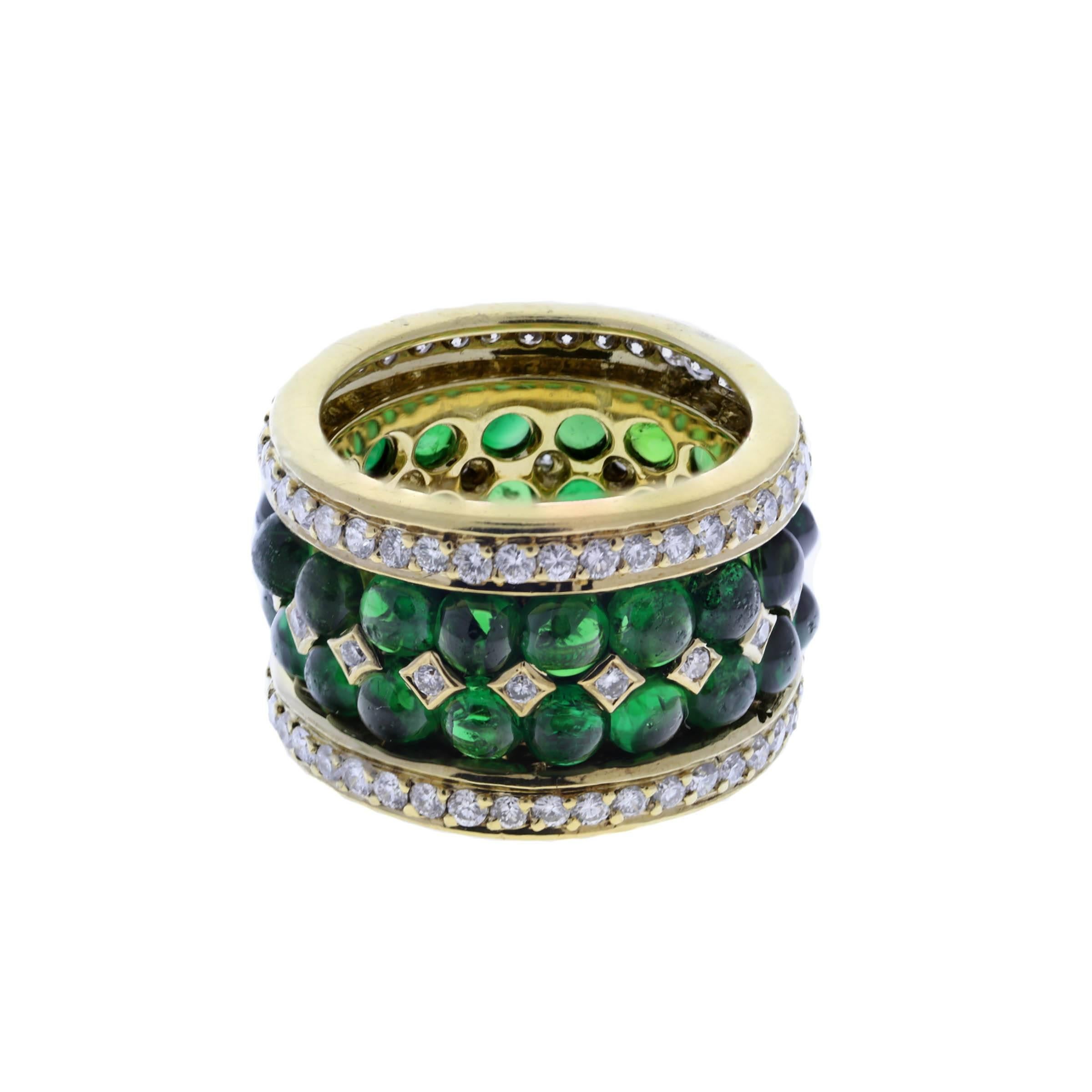 18K one-of-a-kind green tourmaline cabochon and diamond band ring. The tourmalines weigh combined 15.8 carats and the diamonds weigh combined 1.68 carat.
Size 6 1/2. Ring can not be sized.