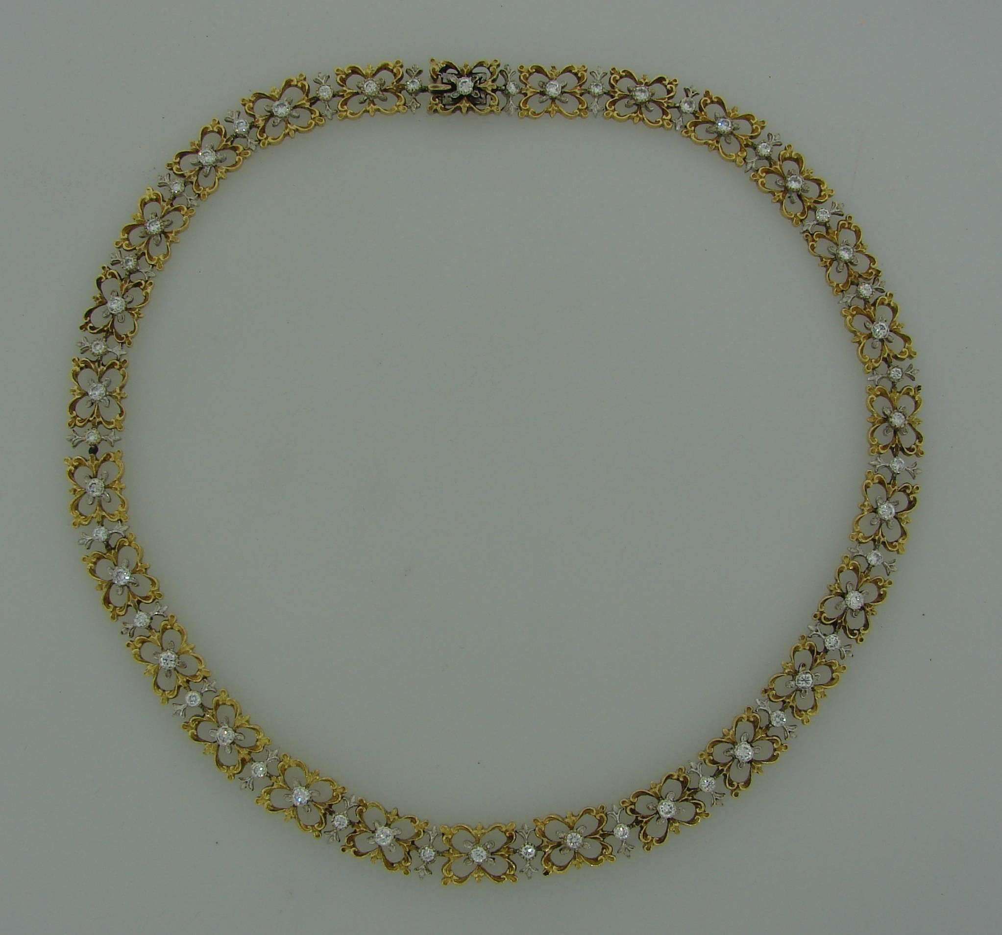 Feminine and delicate necklace created by Buccellati in Italy in the 1990's. Favorite Buccellati floral design. The necklace is made of 18k yellow and white gold and set with round brilliant cut diamonds (diamond total weight is approximately 2.21