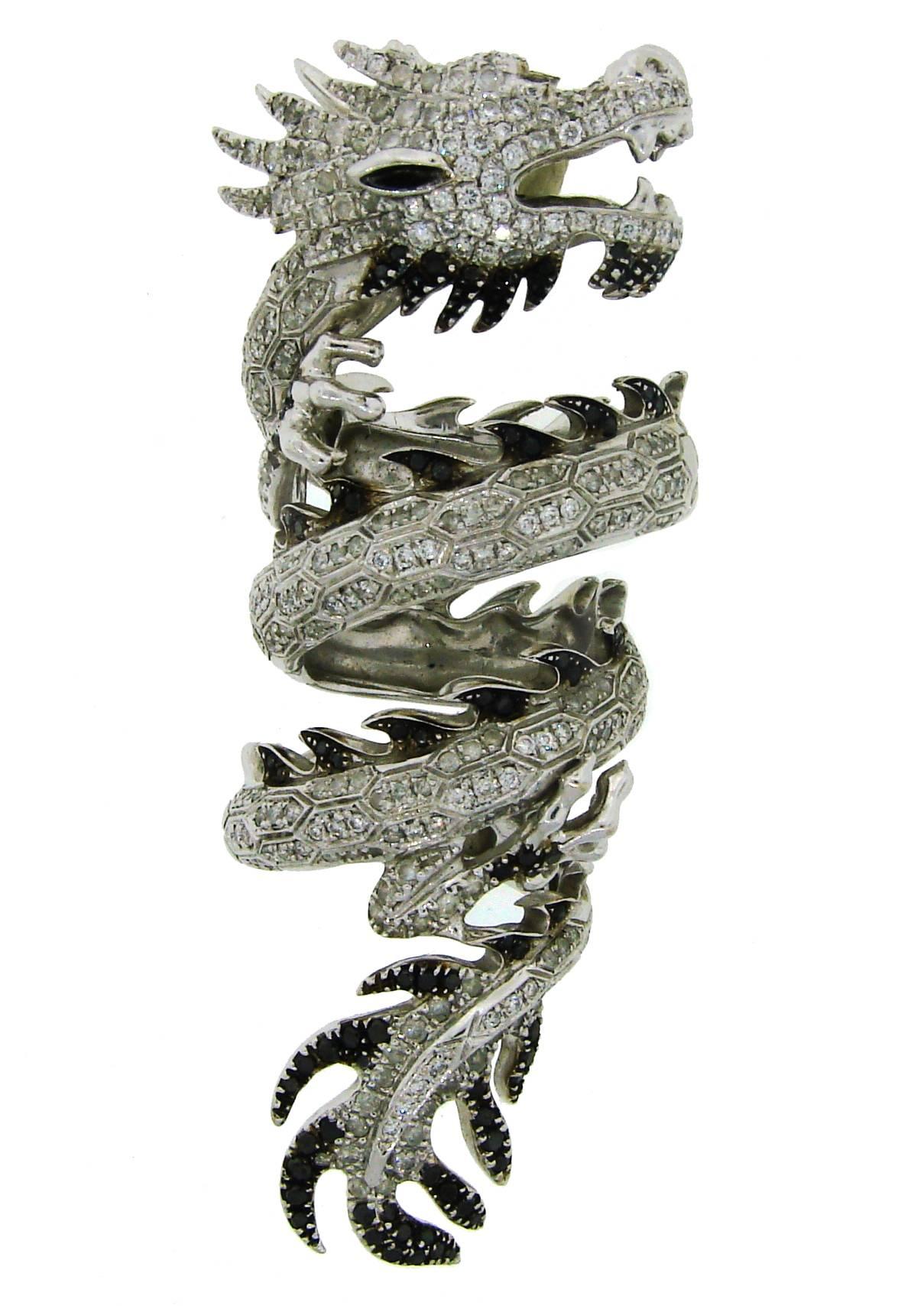 Stunning dragon ring created by a Parisian designer Elise Dray. She creates a dreamlike, fantastic universe with a hint on naturalism art, inspired by the animal kingdom, offers wild and original creations. This articulated ring is a perfect example