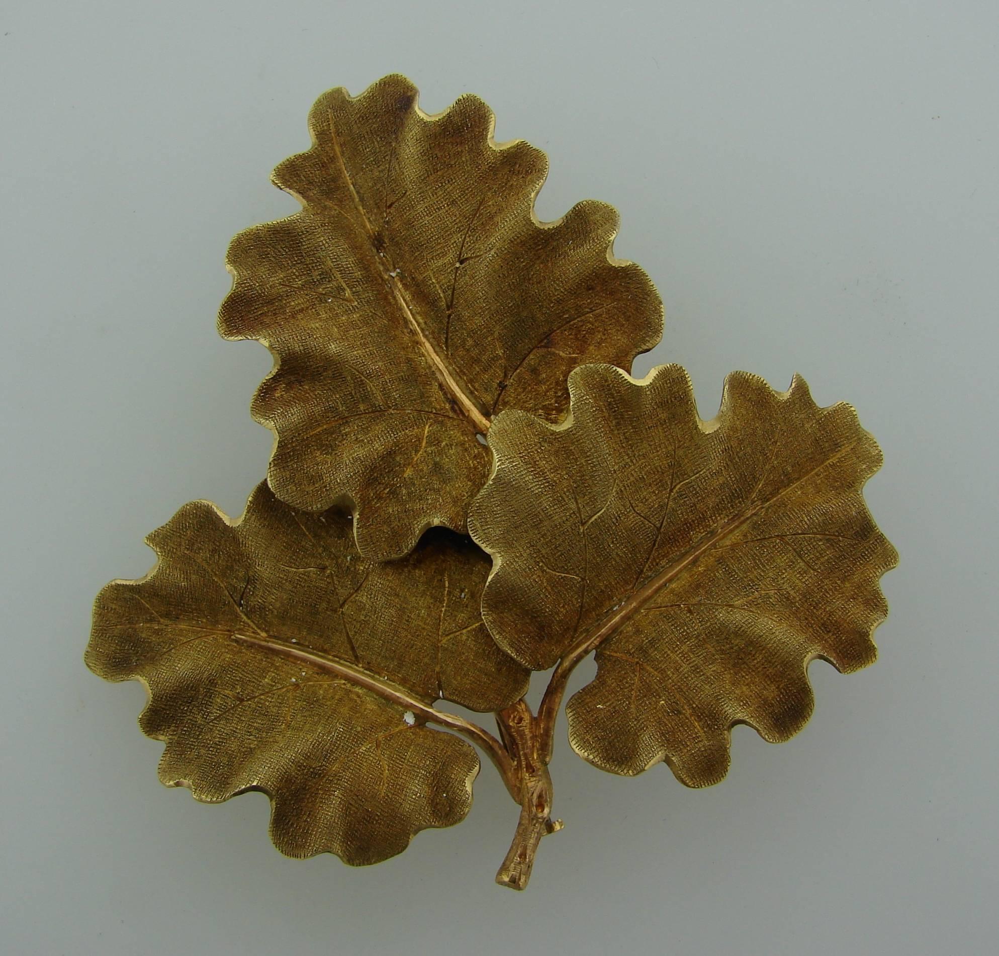 Chic lovely Oak leaves clip created by Mario Buccellati in Italy in the 1950's. It makes a tasteful accent to any outfit. 
The pin is made of 18 karat (stamped) yellow gold.
It is stamped with Mario Buccellati maker's mark, country of manufacture