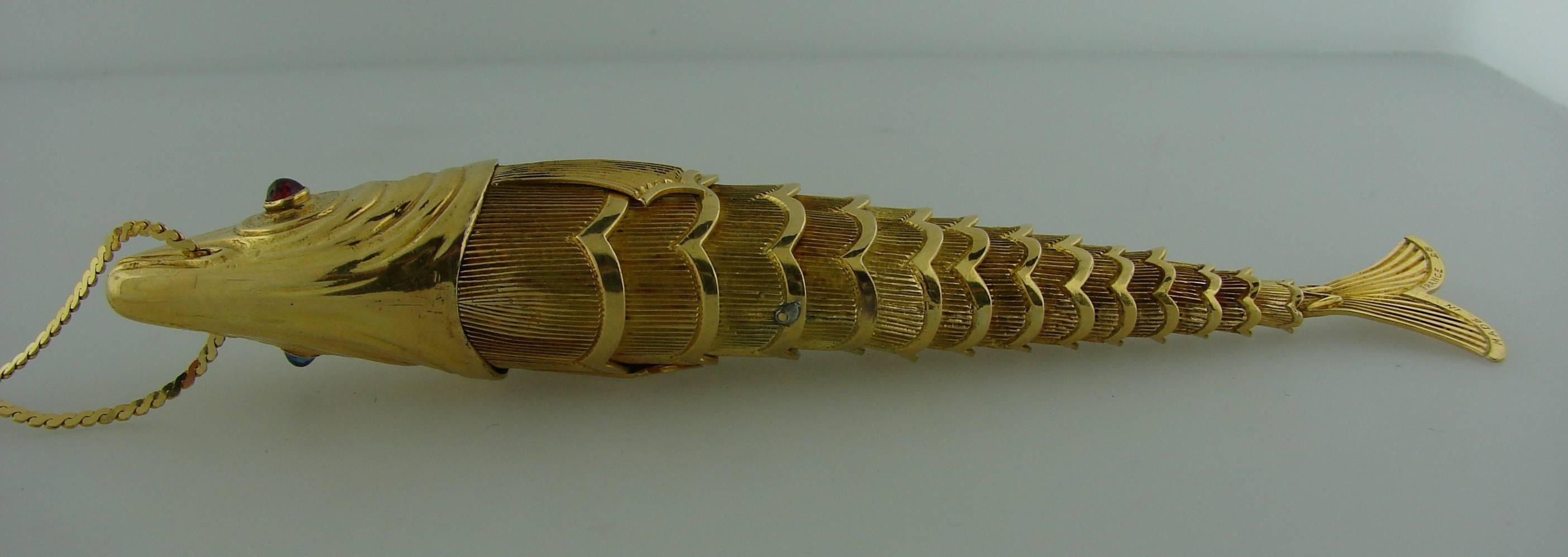 14k gold fish pendant