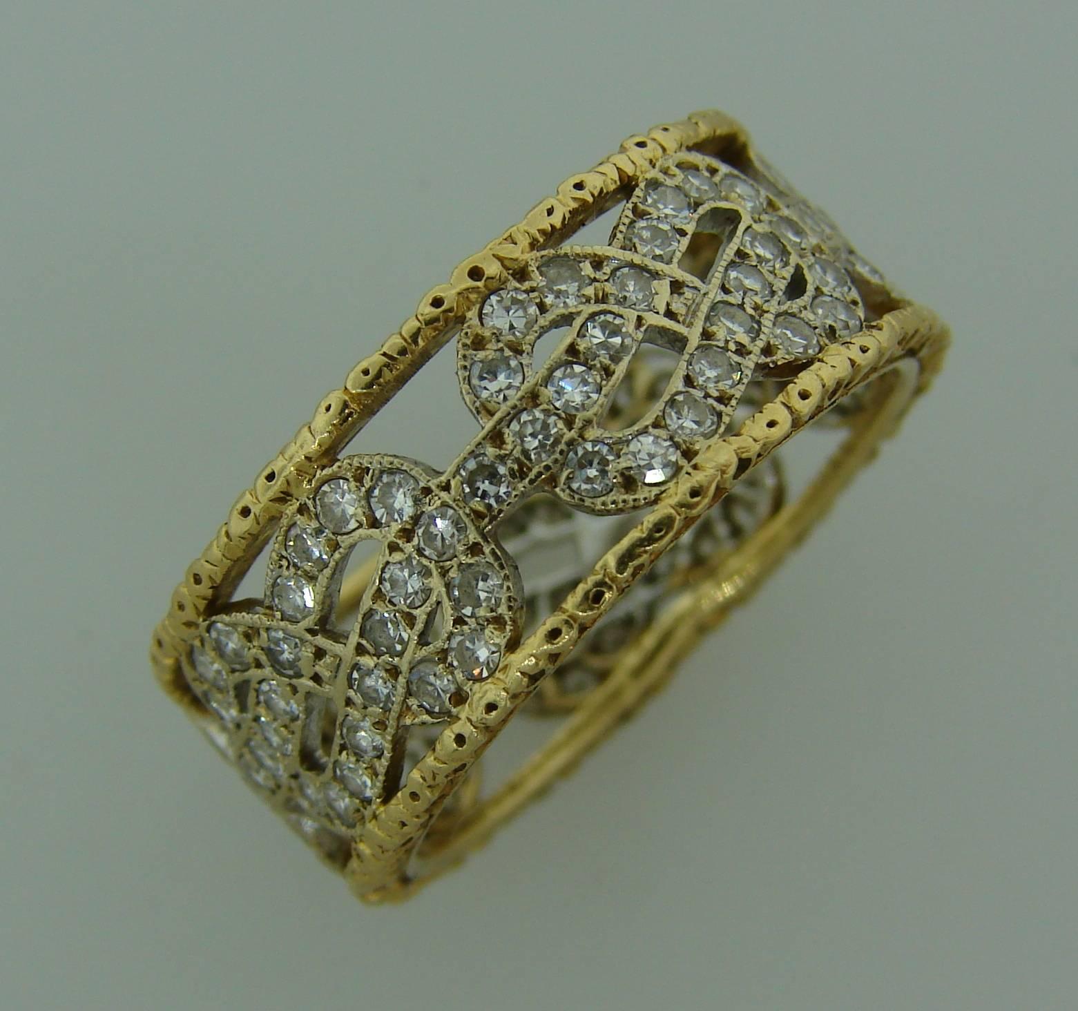 Lovely signature Buccellati band ring created by Mario Buccellati in the 1950's.
The ring is made of 18 karat (stamped) yellow and white gold and encrusted with single cut diamonds.
Size 6.25. Weight 4.6 grams.
The band is 5/16