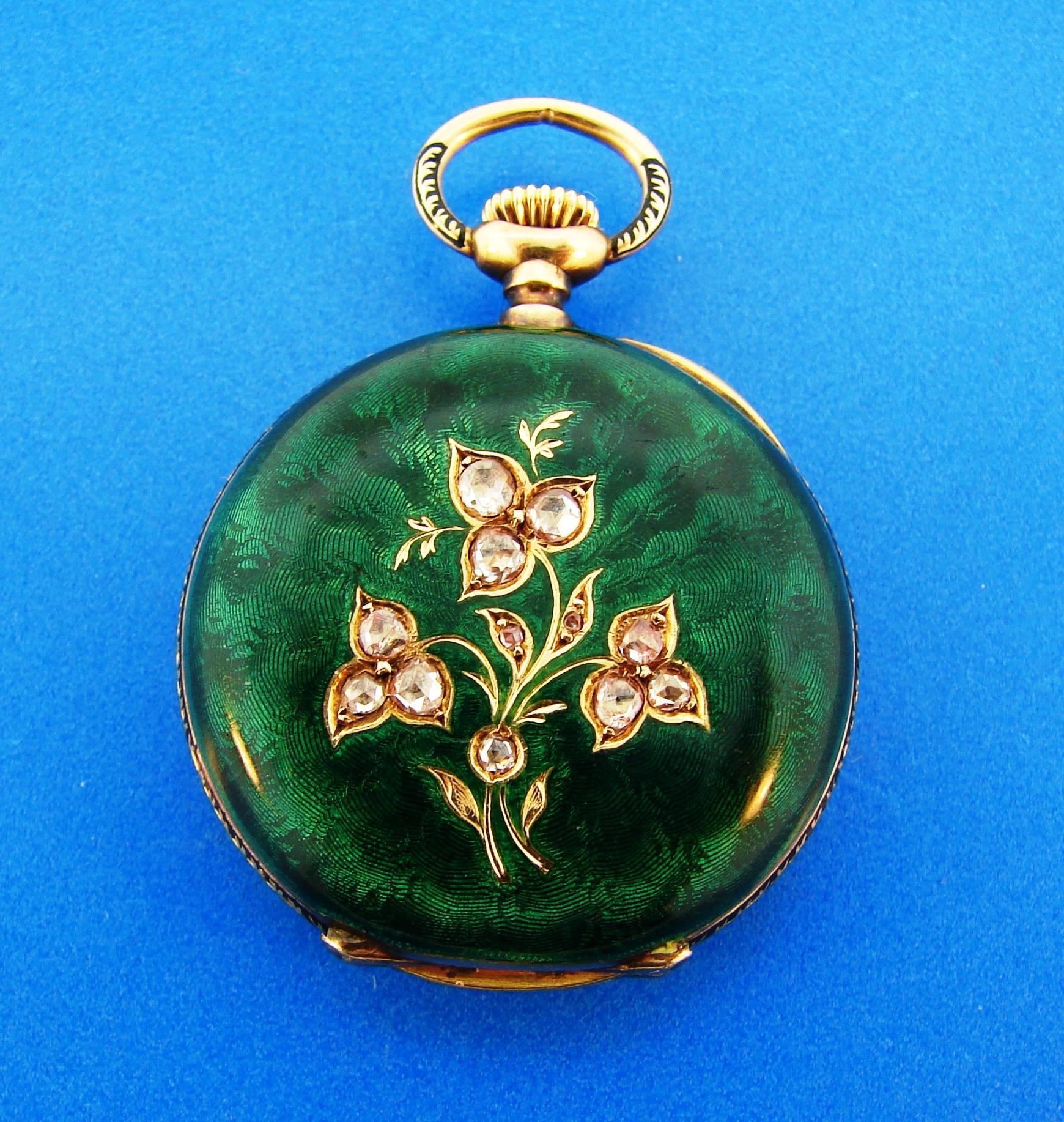 Lovely enameled pocket watch/pendant created by Tiffany & Co. in the 1900's. It is made of 18 karat yellow gold, green enamel and accented with rose cut diamonds. The quality of enameling is outstanding!
The watch is manual-wind, mechanical,
