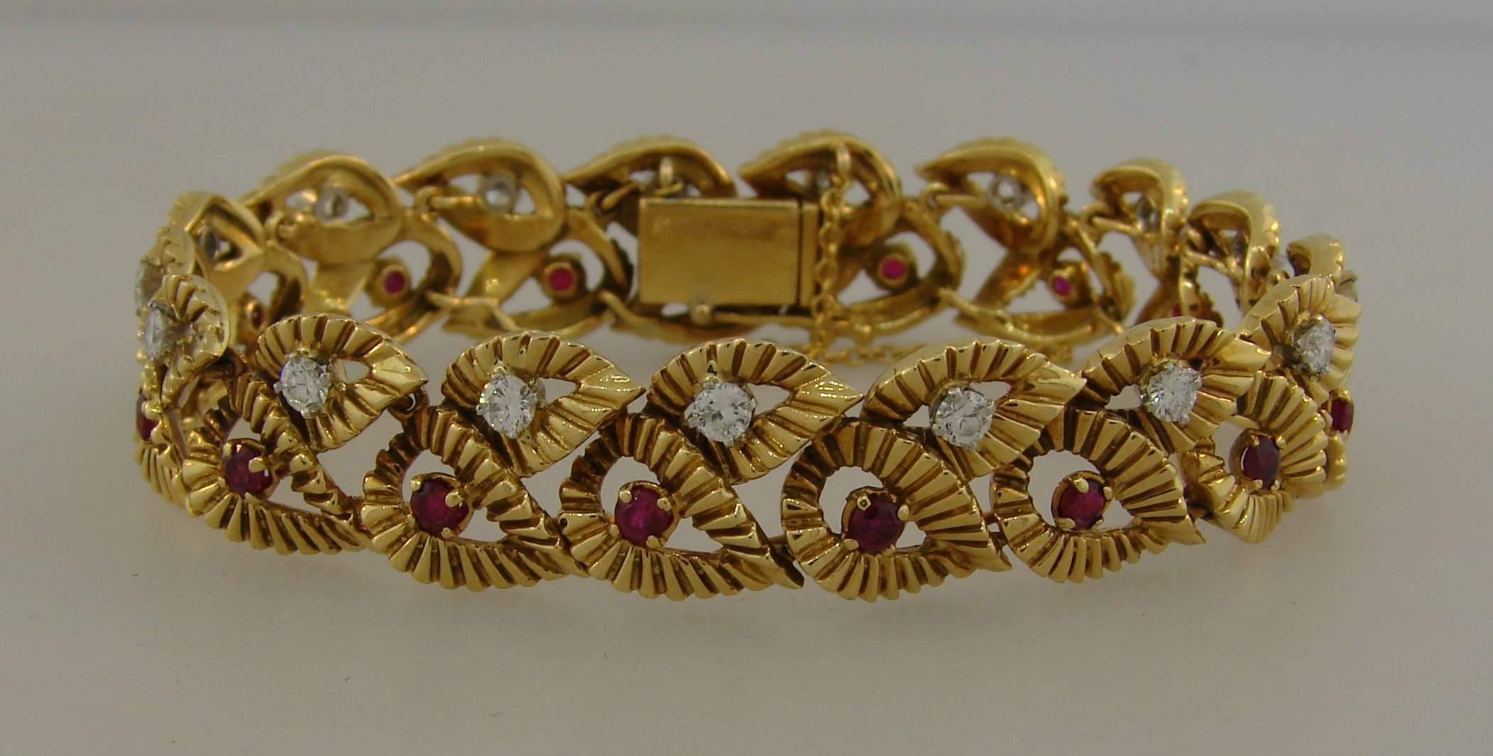 Delicate feminine bracelet created by French Jewelry Maison Boucheron in the 1950s. Wearable and elegant, it is a great addition to your jewelry collection. 
It is made of 18 karat yellow gold and sprinkled with round rubies (total weight