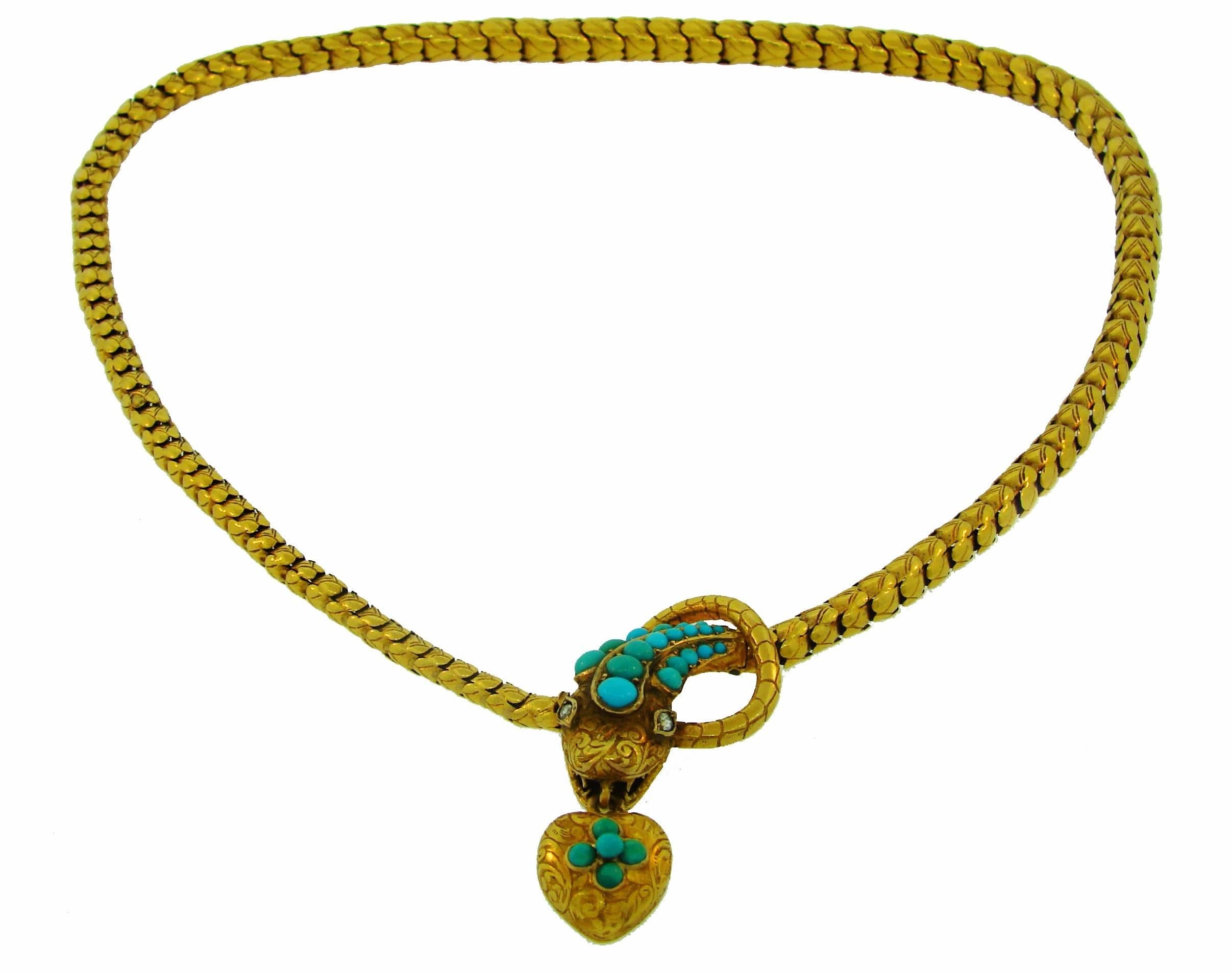 Stunning Victorian snake necklace created in the 1900's.
People were always fascinated by snakes and since ancient times that fascination has made snake motif widely used in jewelry. 
This necklace is made of yellow gold and turquoise. The snake's