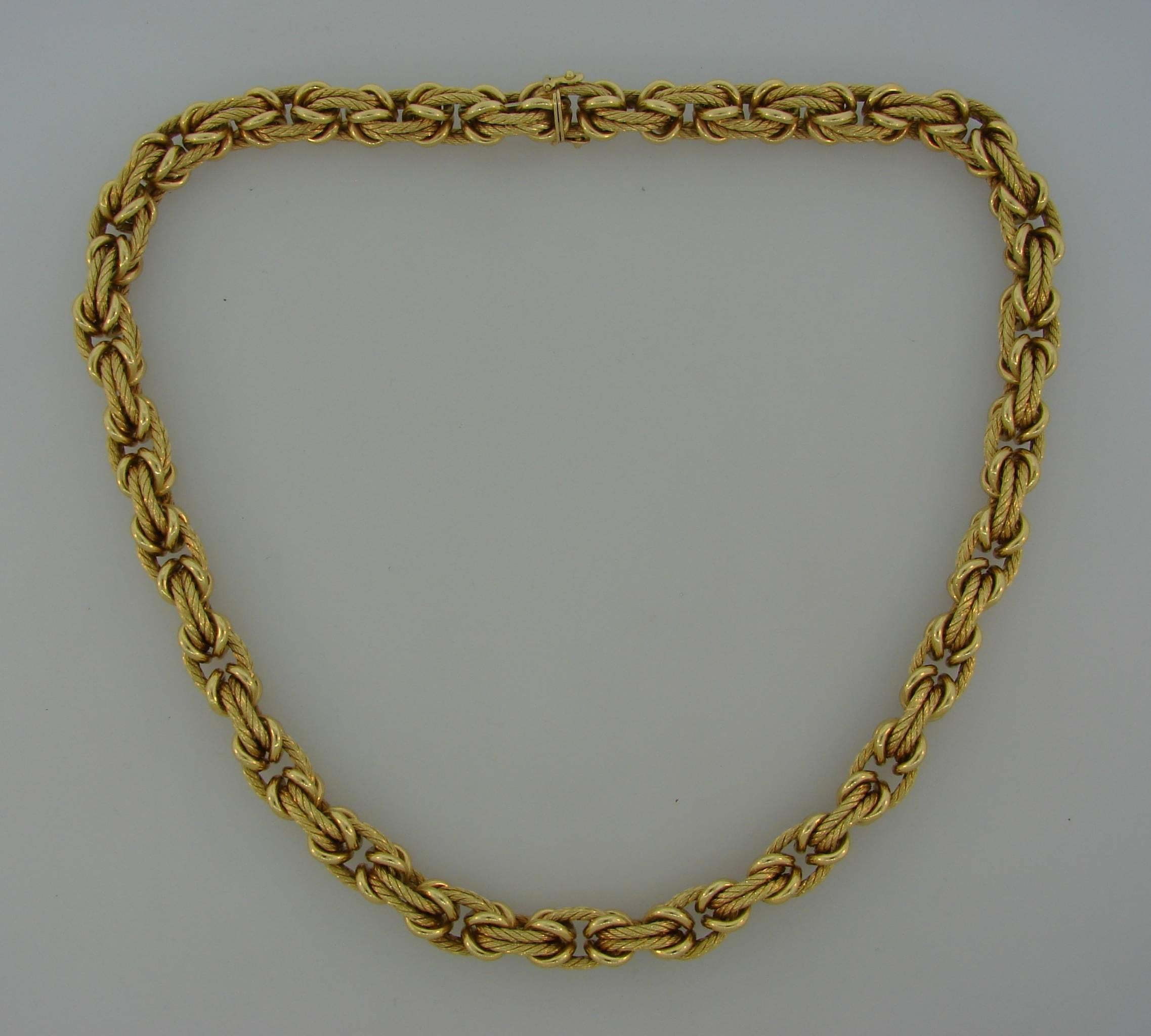 Chic and stylish rope chain necklace created by Van Cleef & Arpels in the 1970's. Beautifully designed links, a tasteful combination of high polished and textured gold and volume are the highlights of this necklace. The chain is different and