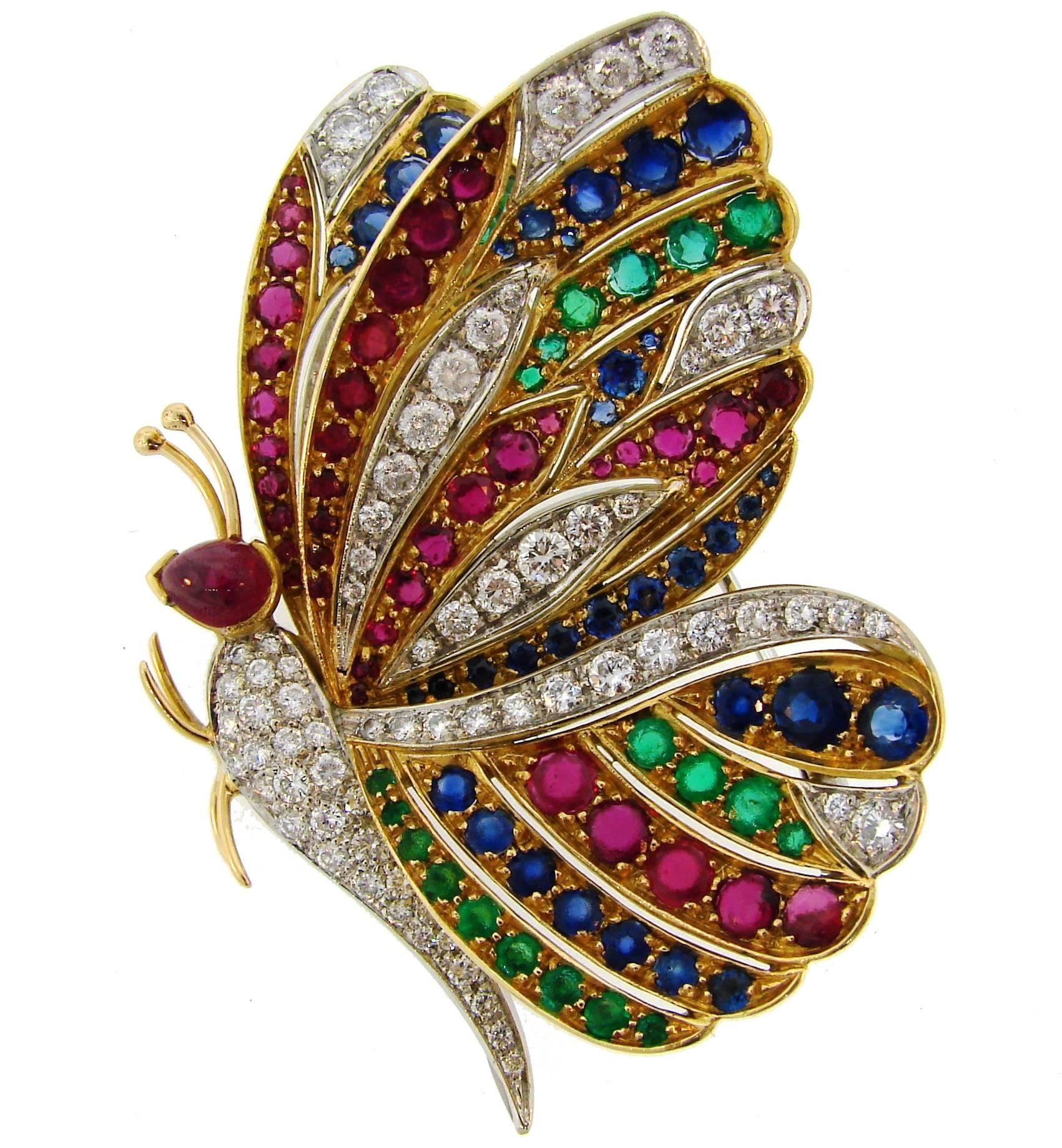 Lovely colorful butterfly pin created in Italy in the 1980's. Its gracious lines, rich colors and sparkle of the diamonds make the clip a chic and stylish accent on your blouse, dress, jacket or sweater. It is elegant and wearable and is a great