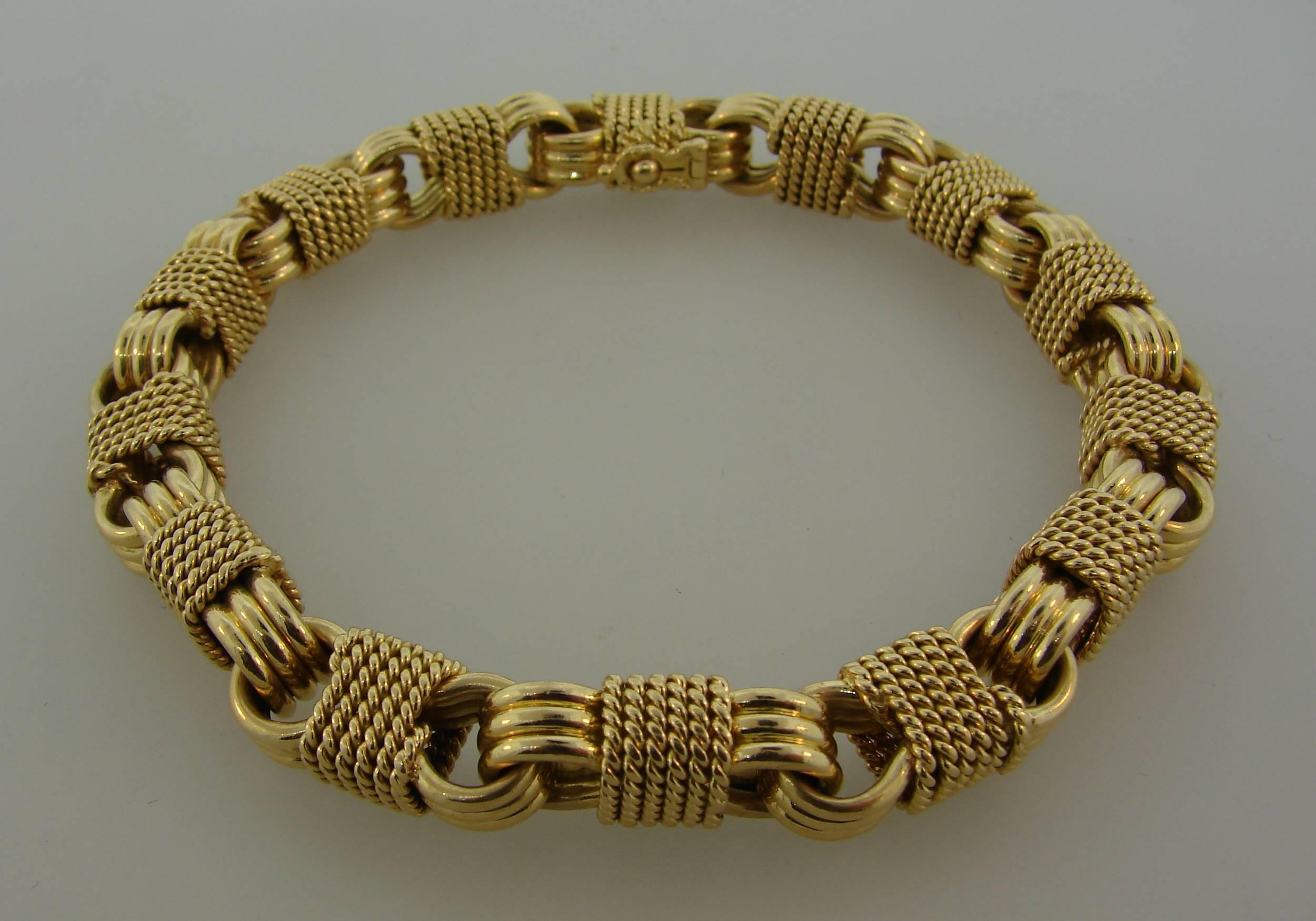 Bold yet elegant bracelet created by Van Cleef & Arpels in France in the 1970's. Classic, timeless and wearable, it is a great addition to your jewelry collection. 
The bracelet is made of 18 karat yellow gold, is 8.5 inches (21 cm) long, 5/16 inch