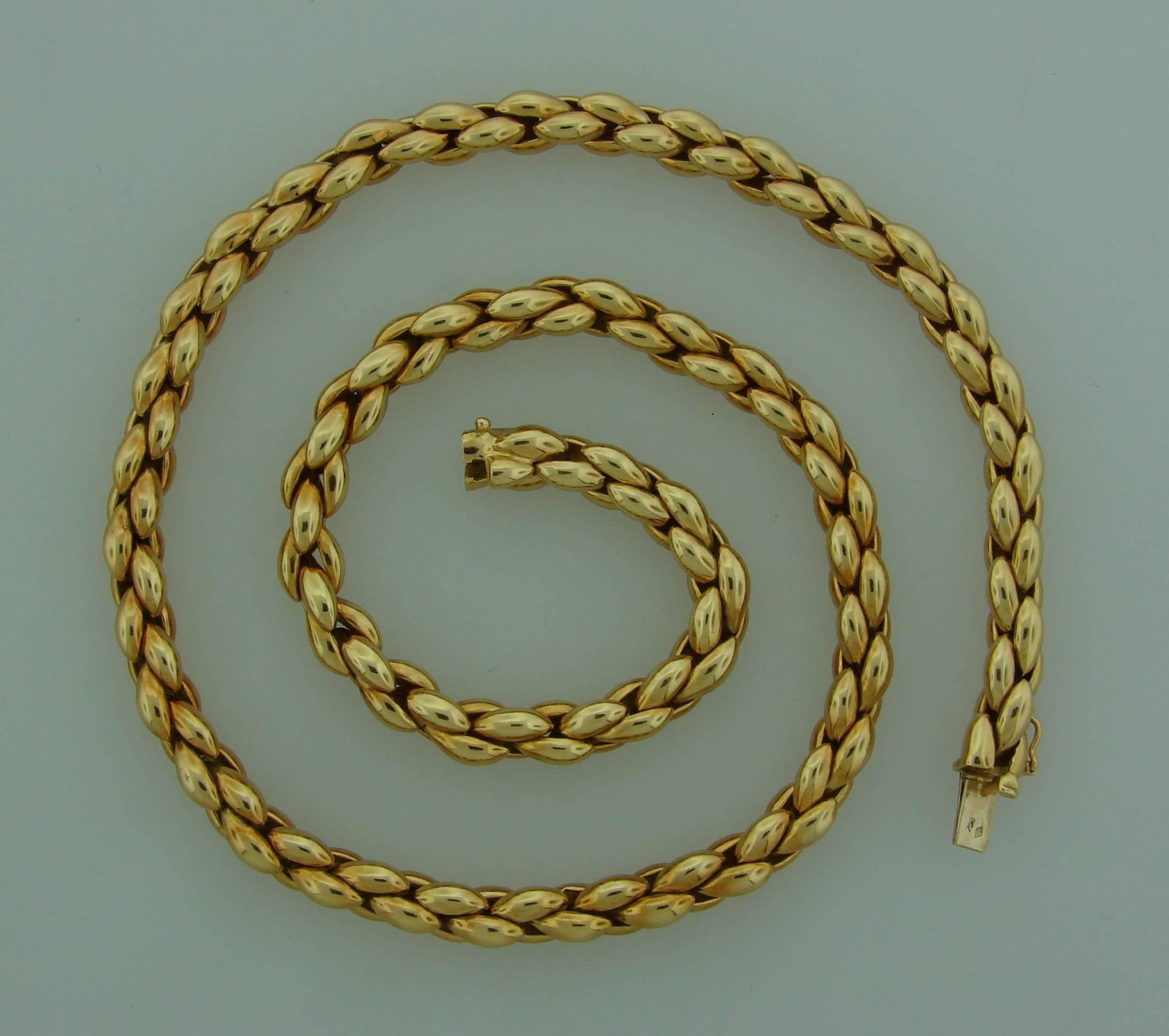 Elegant, smooth and wearable chain necklace that is a great addition to your jewelry collection. It was created by Cartier in 1993. 
The necklace is made of 18 karat yellow gold. 
It is 17 inches (42.5 cm) long and slightly under 1/4 of an inch