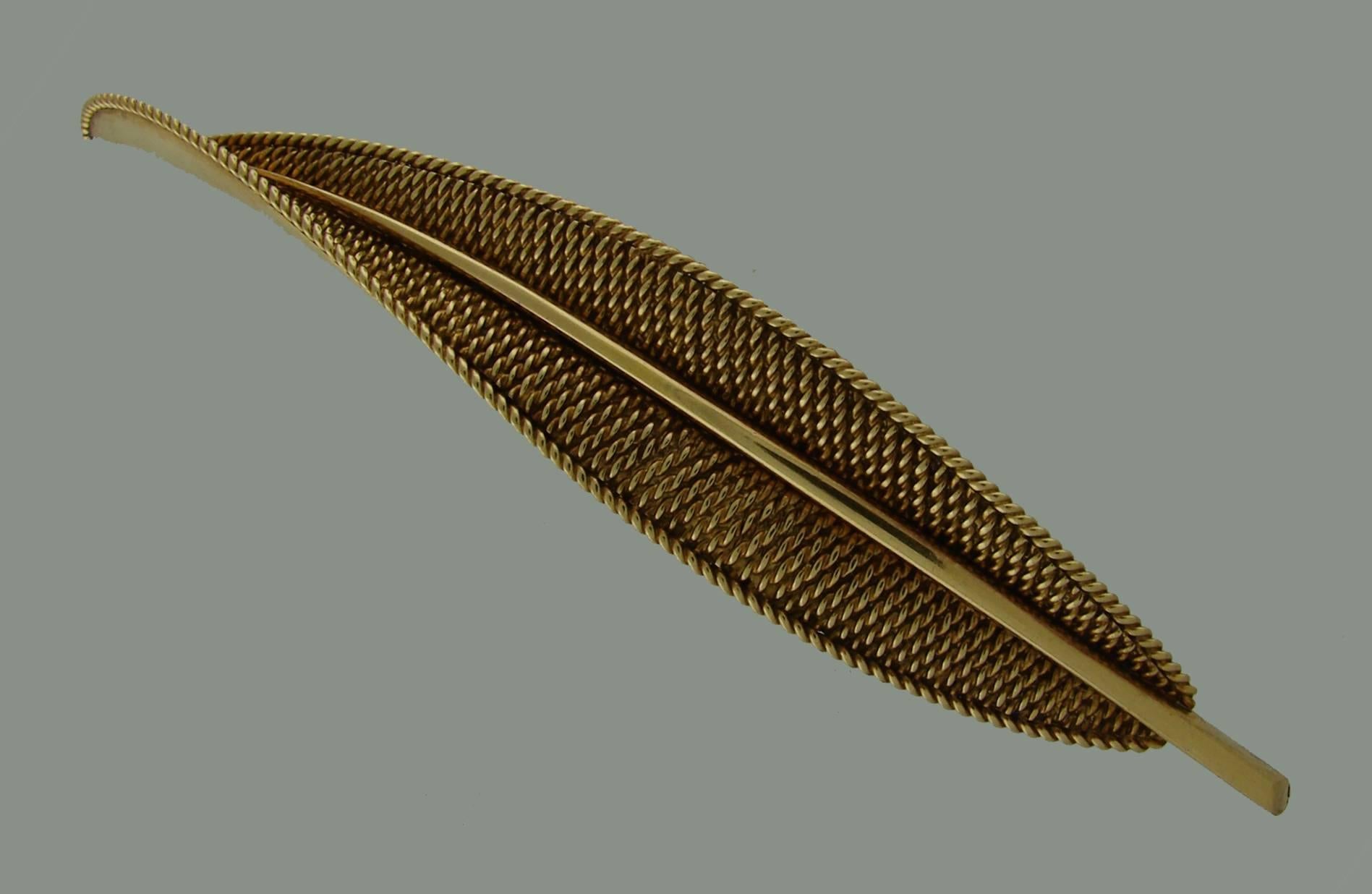 French chic leaf clip created by an exquisite Jewelry House Pierre Sterle in Paris in the 1950's. Perfect proportions, gracious lines and beautiful texture are the highlights of this classy pin. Elegant, timeless and wearable, the brooch is a great