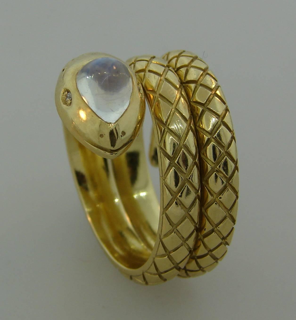 People were always fascinated by snakes and since ancient times that fascination has made snake motif widely used in jewelry. This elegant and stylish ring is a perfect example of it! Created by Temple St. Clair in the 1980's, the ring is made of 18
