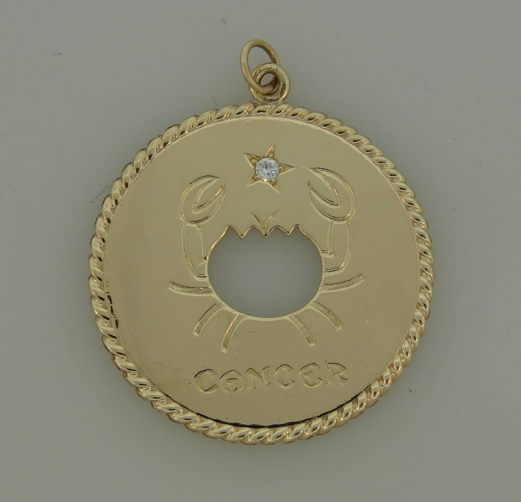 Lovely and fun Cancer Zodiac pendant created by Cartier NY in the 1970s. A perfect gift for someone who was born between June 20 and July 22. 
Made of 14 karat (stamped) yellow gold and accented with one round brilliant cut diamond. 
The pendant
