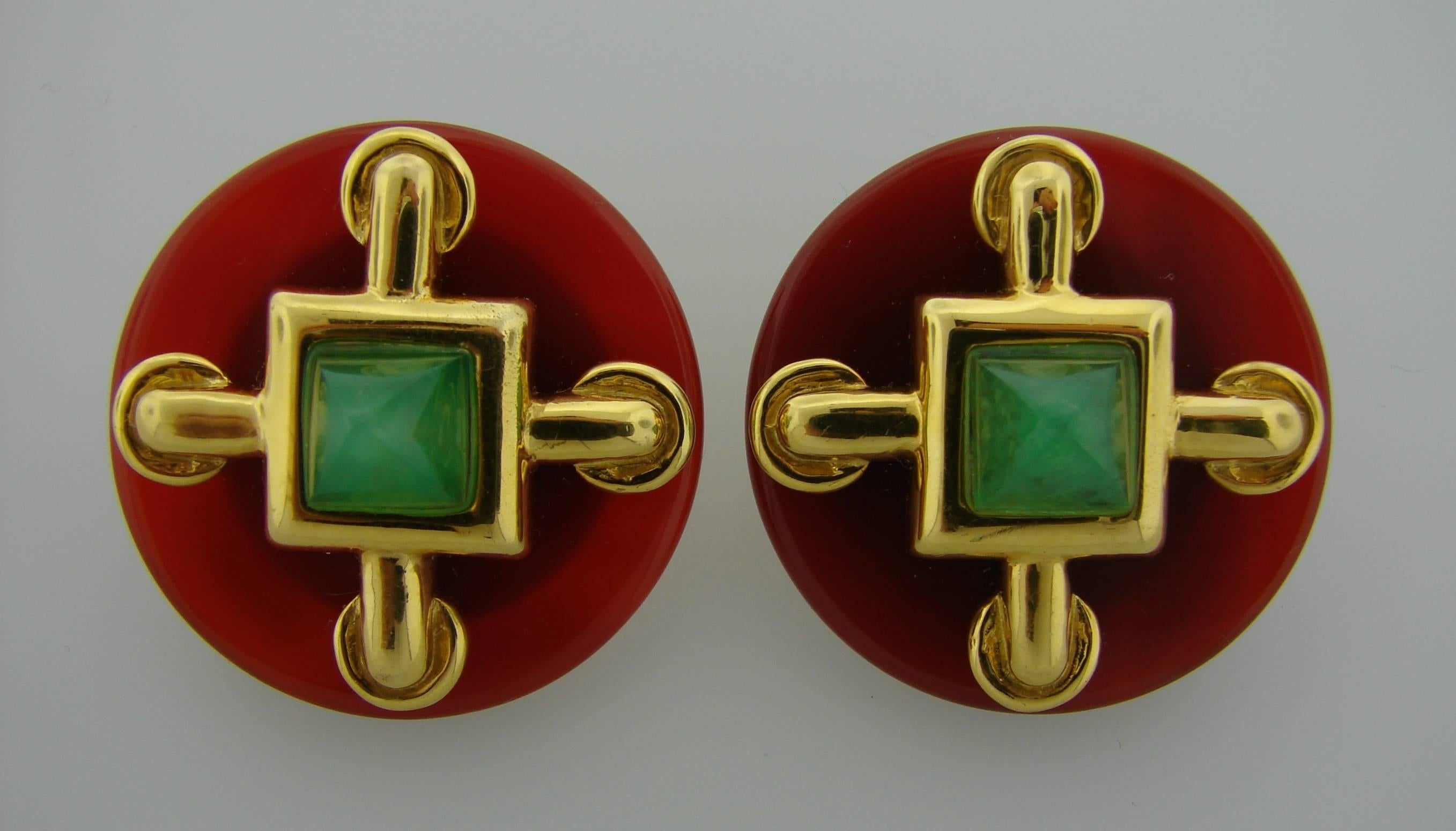 Signature earrings designed by Aldo Cipullo for Cartier in 1974. Colorful, bold yet elegant and wearable, the earrings are a great addition to your jewelry collection.
They are made of 18 karat yellow gold, carnelian and chrysophrase. 
The earrings