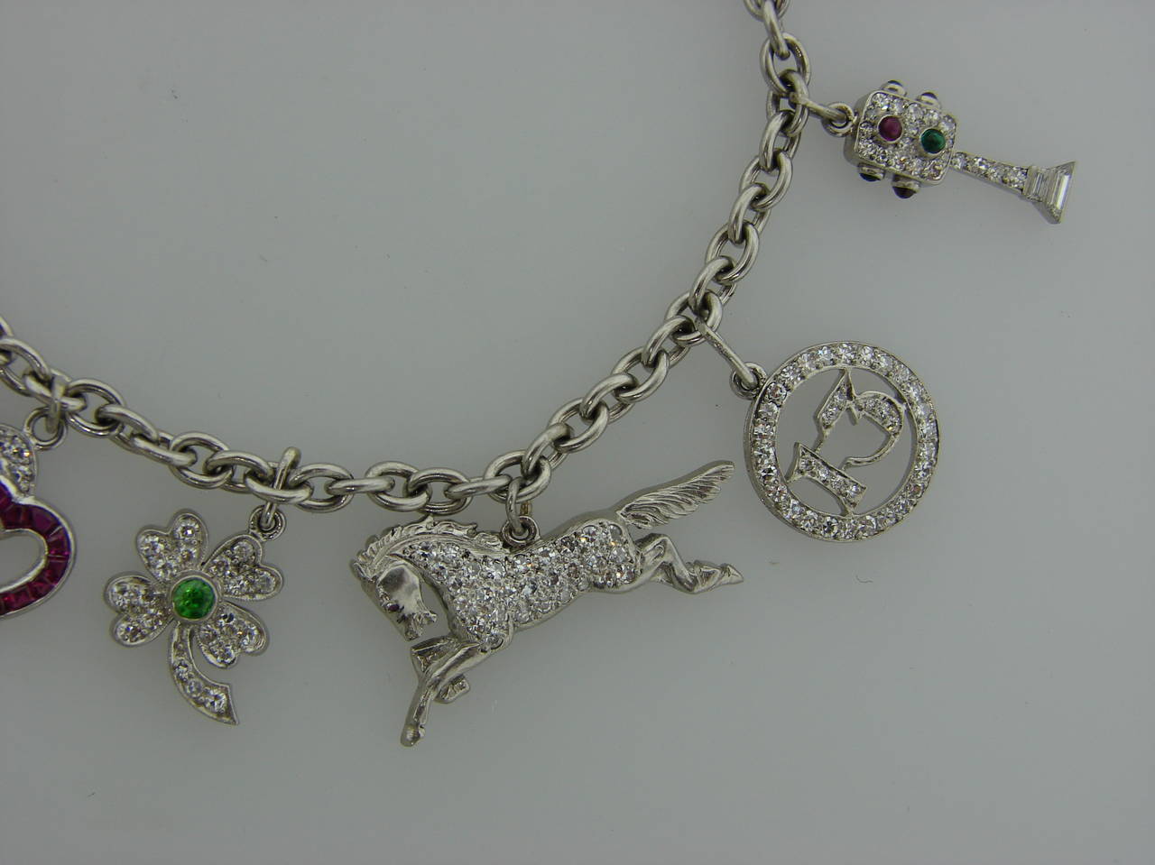 Y2K Aesthetic — Tiffany & Co. charm bracelet, an early 2000s