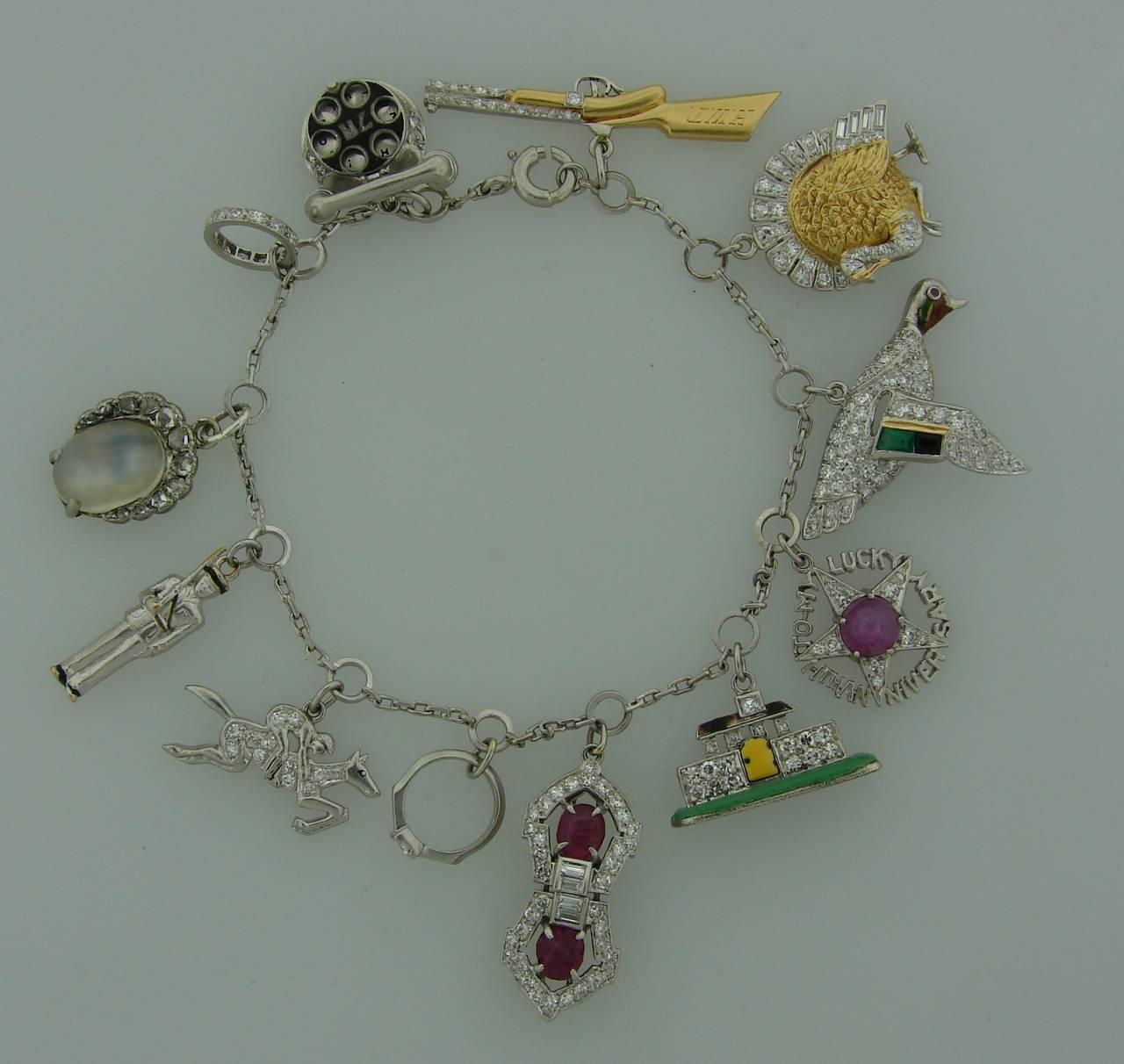 Amazing charm bracelet - unique and fun as every charm is a masterpiece and tells a story! - the rifle, the turkey, the engagement ring, the wedding band, 