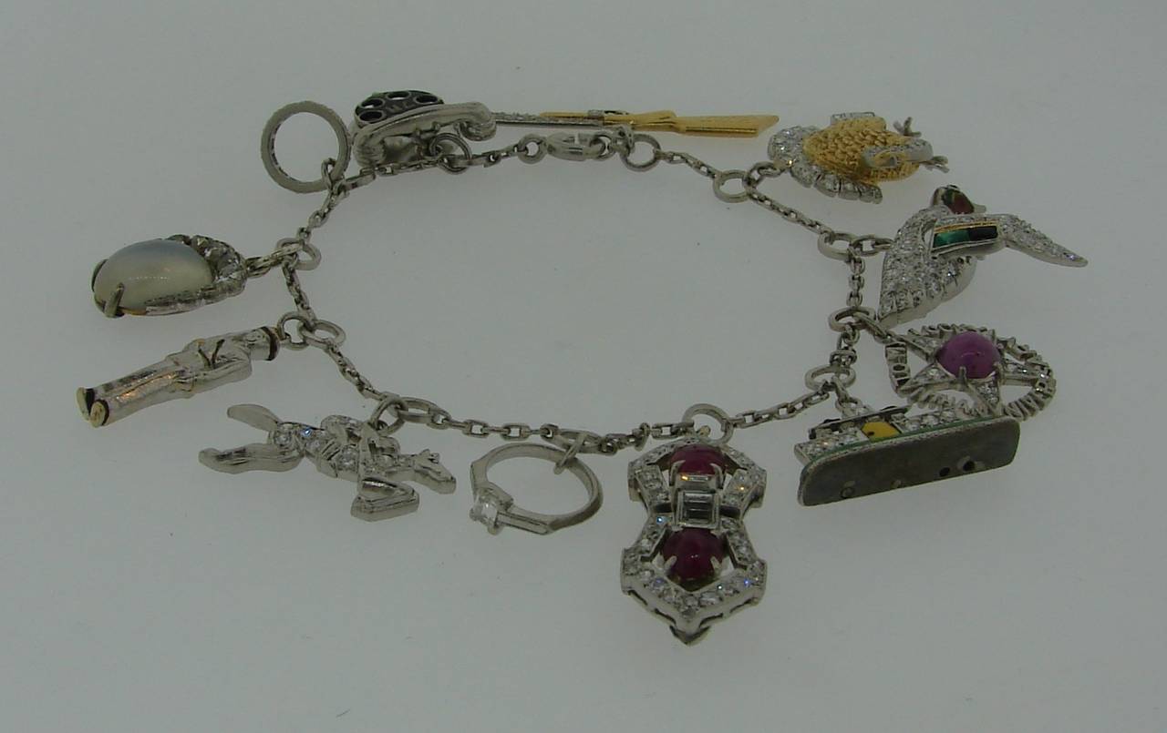 Art Deco c. 1920s Multi Gems Enamel Gold & Platinum Charm Bracelet In Excellent Condition In Beverly Hills, CA