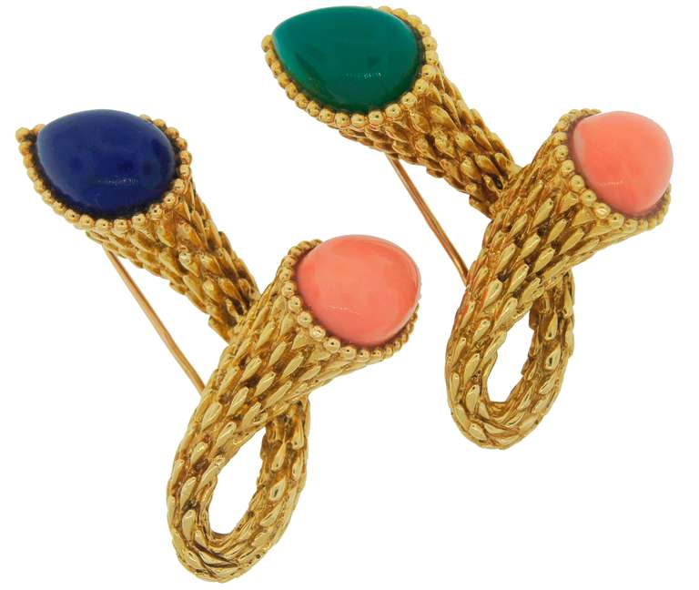Prominent and chic pair of pins created by Boucheron in Paris in the 1970's. 
Features pear-shape coral, chrysophrase and lapis lazuli set in yellow gold. 
Beautiful color combination and perfect proportions!
The set is versatile and playful -